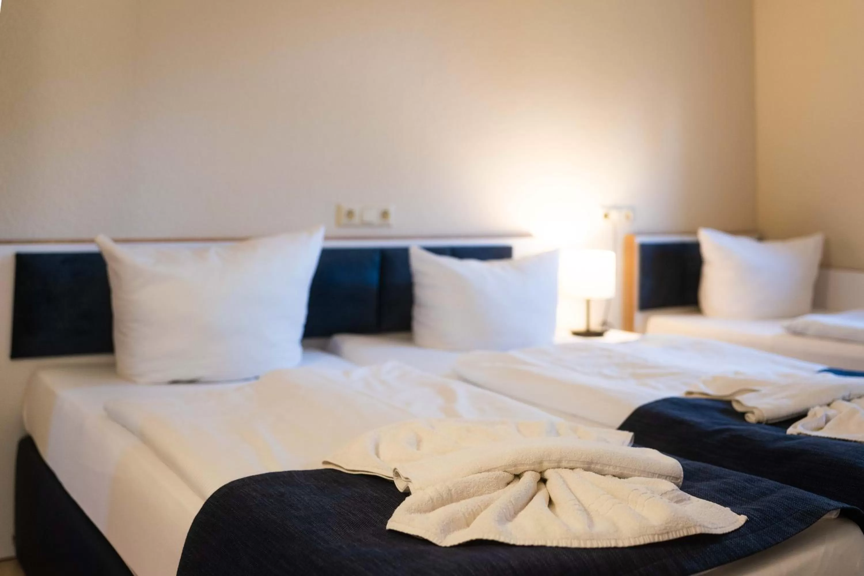 Bed in Aparthotel Stralsund Studios und Apartments