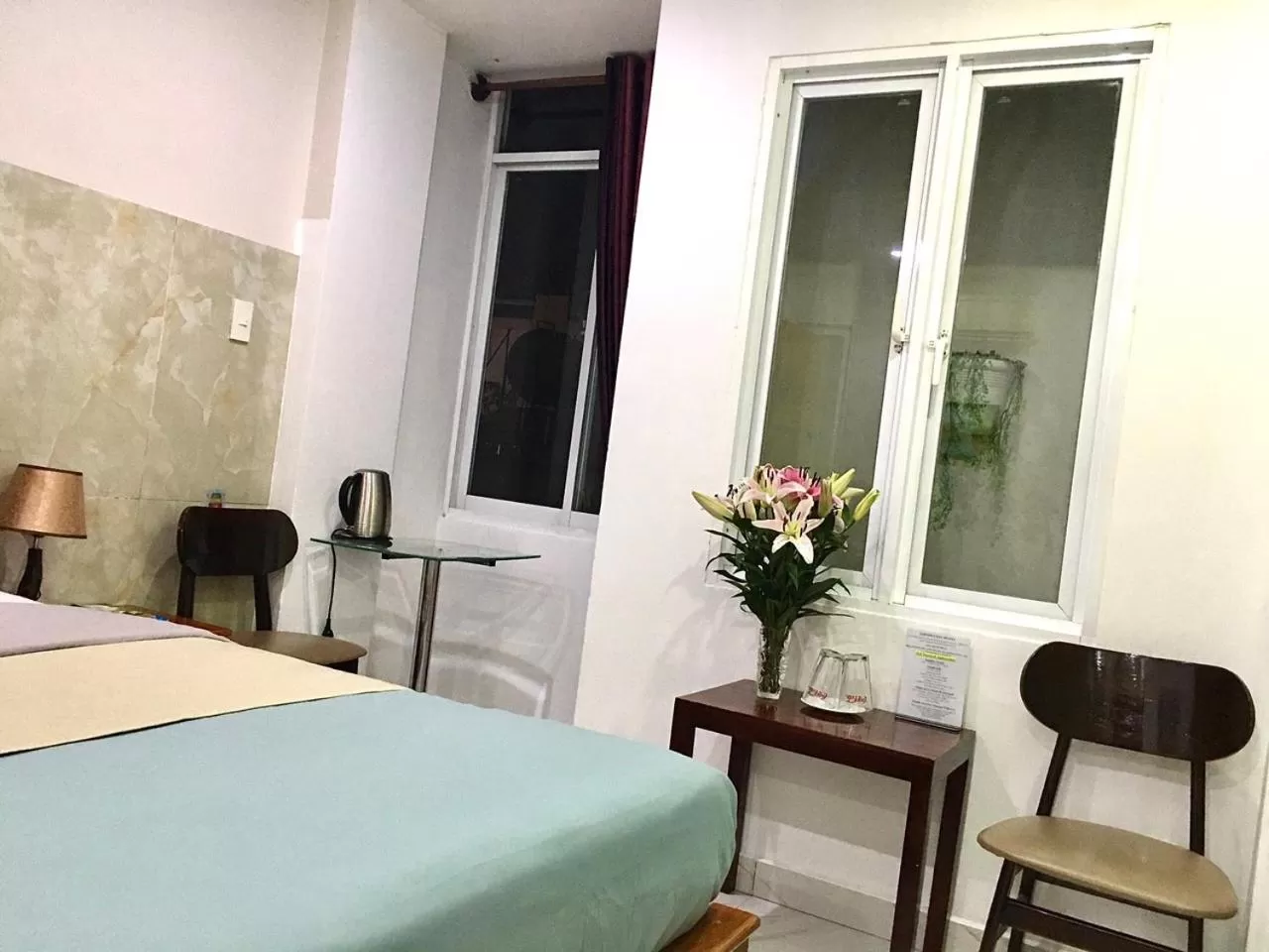 Bed in SaiGon CoZy Hotel "241 Pham Ngu Lao Street''