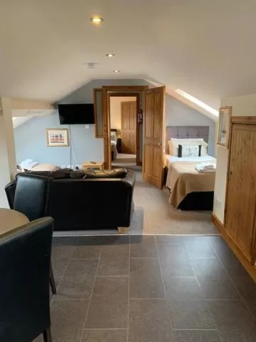 Seating area, Bed in Noble Lands