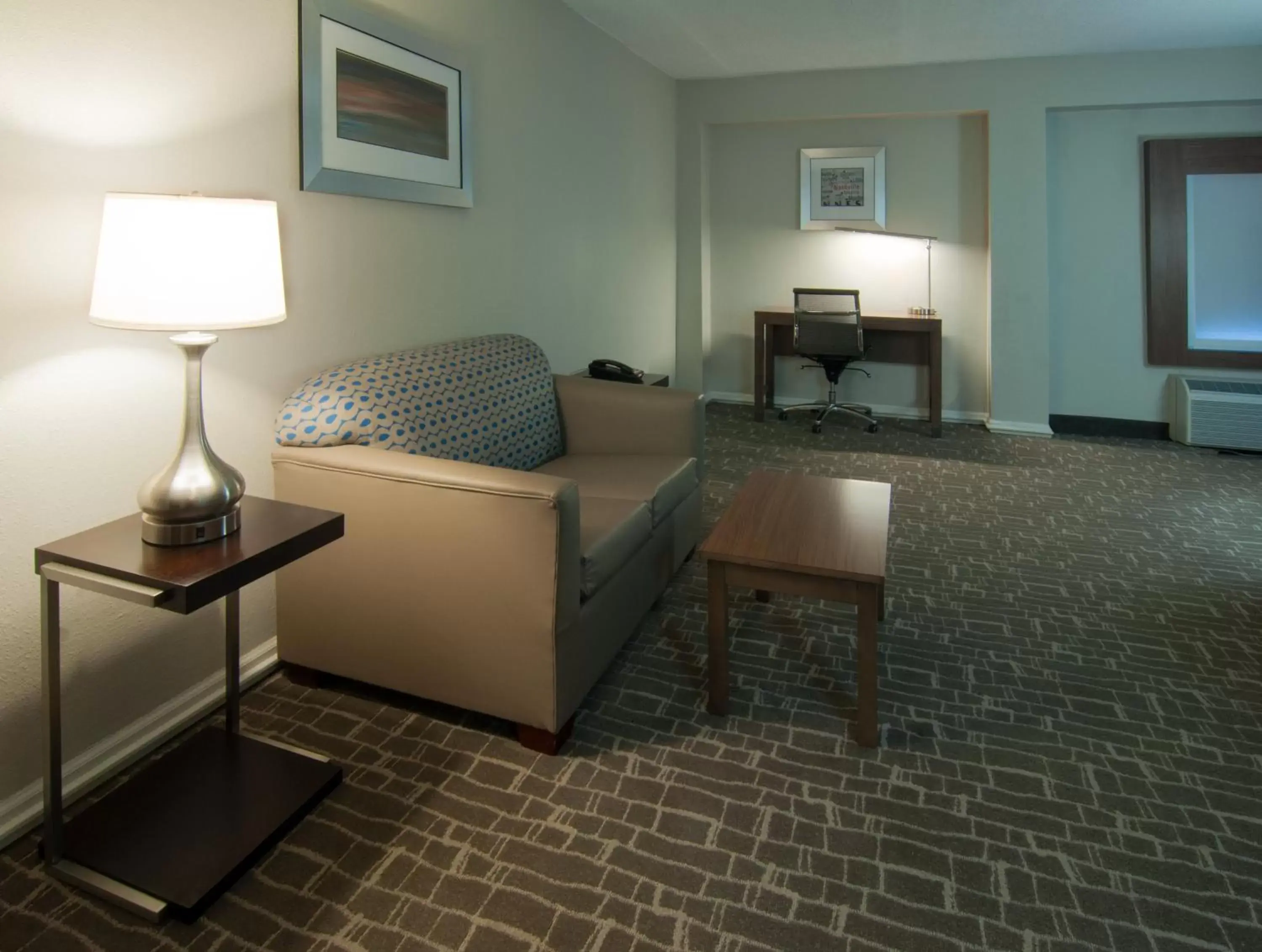 Photo of the whole room, Seating Area in Holiday Inn Express & Suites Nashville-I-40 & I-24(Spence Lane), an IHG Hotel