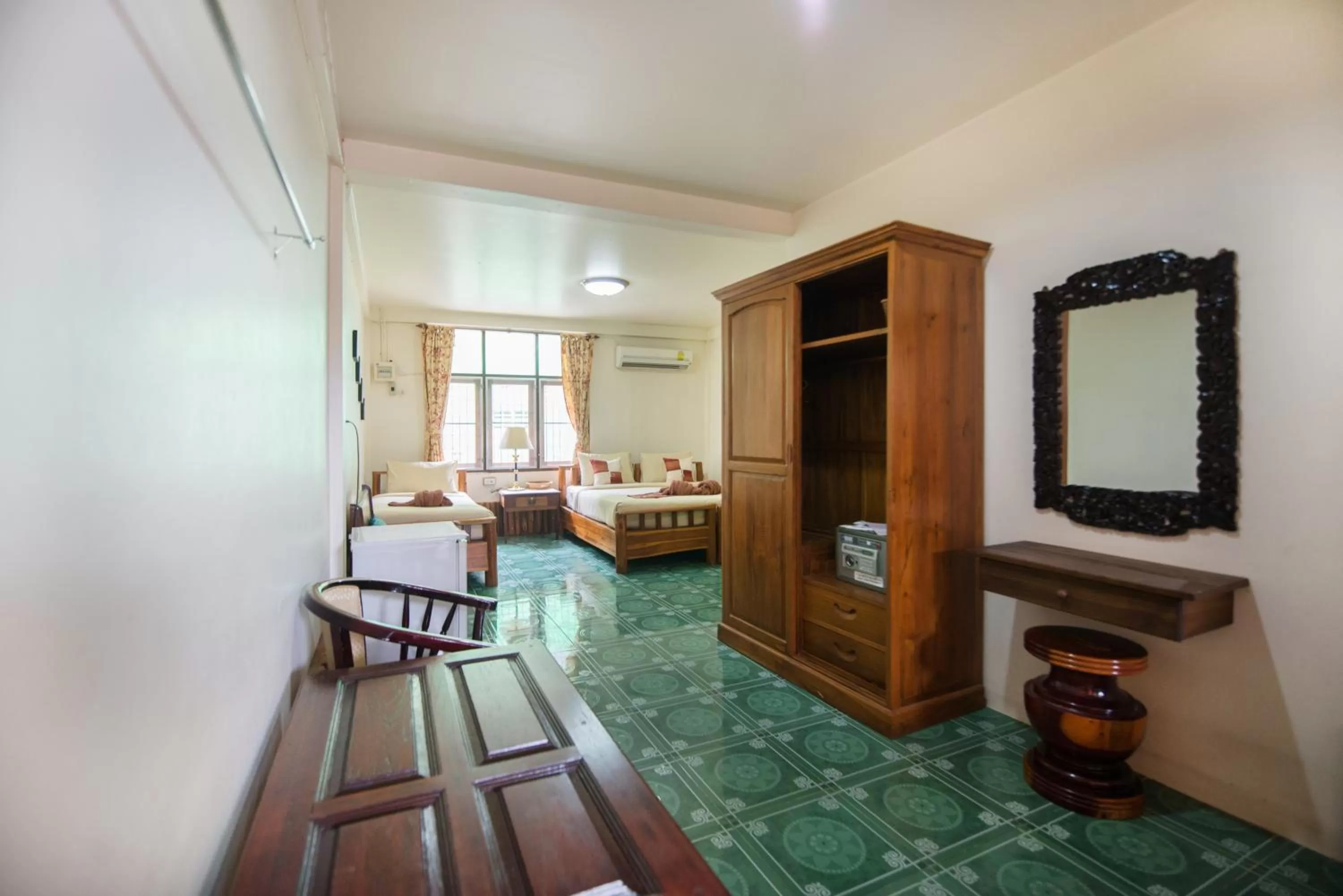 Decorative detail, Bed in Pongphen Guesthouse - SHA Plus Certified