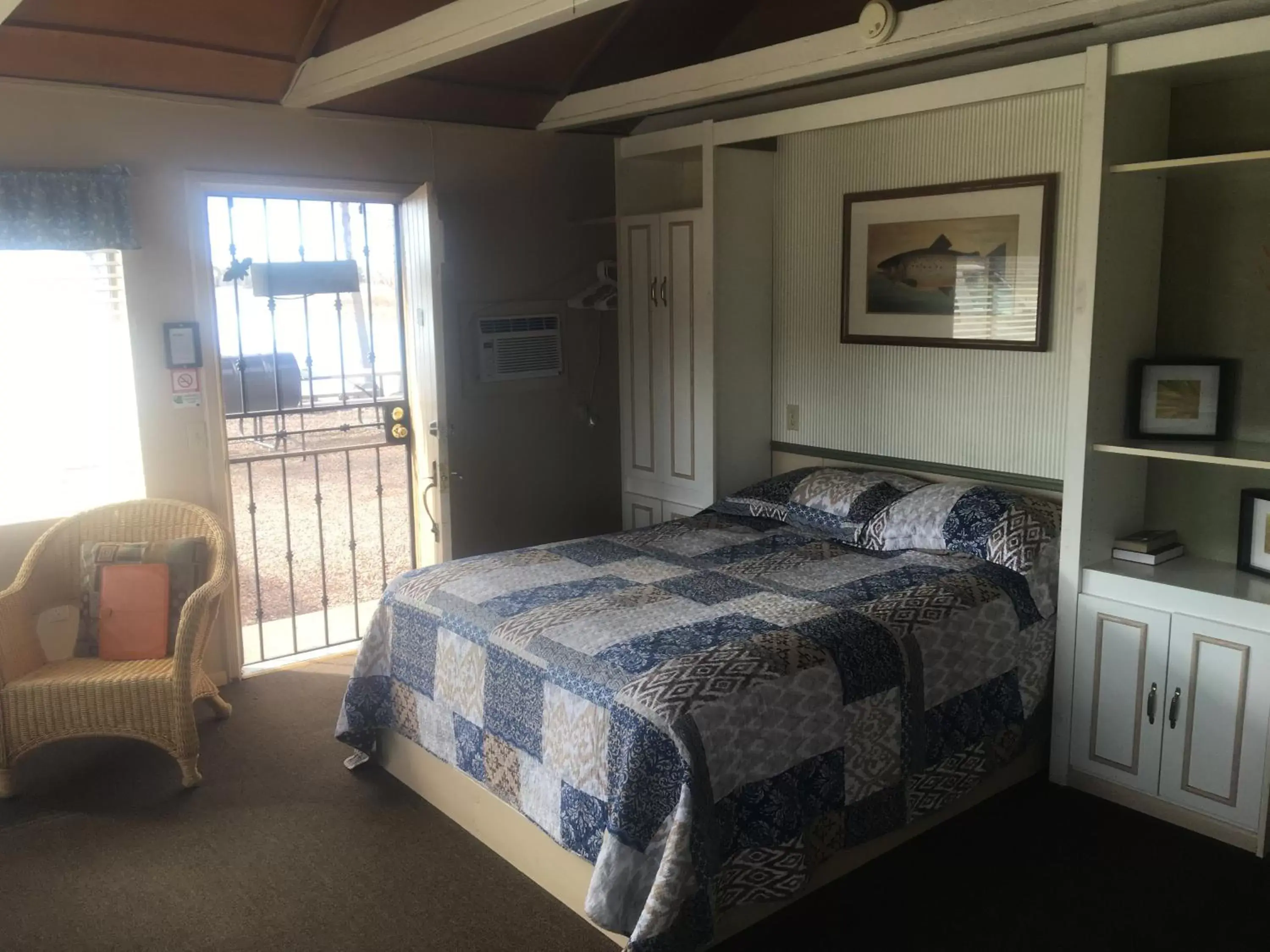 Photo of the whole room, Bed in Rainbows End Fishing Resort