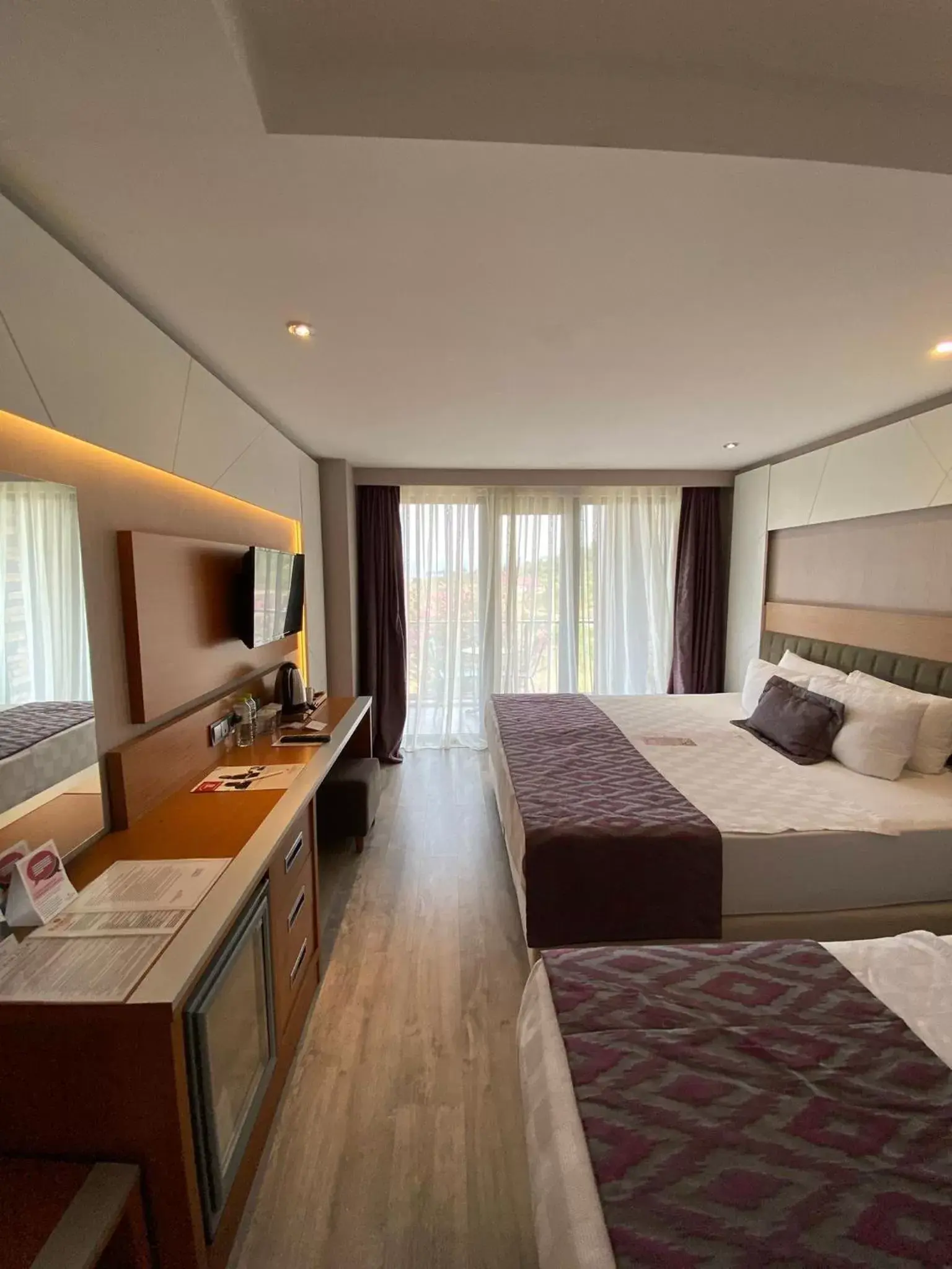 Bed, Kitchen/Kitchenette in Ramada Giresun Piraziz