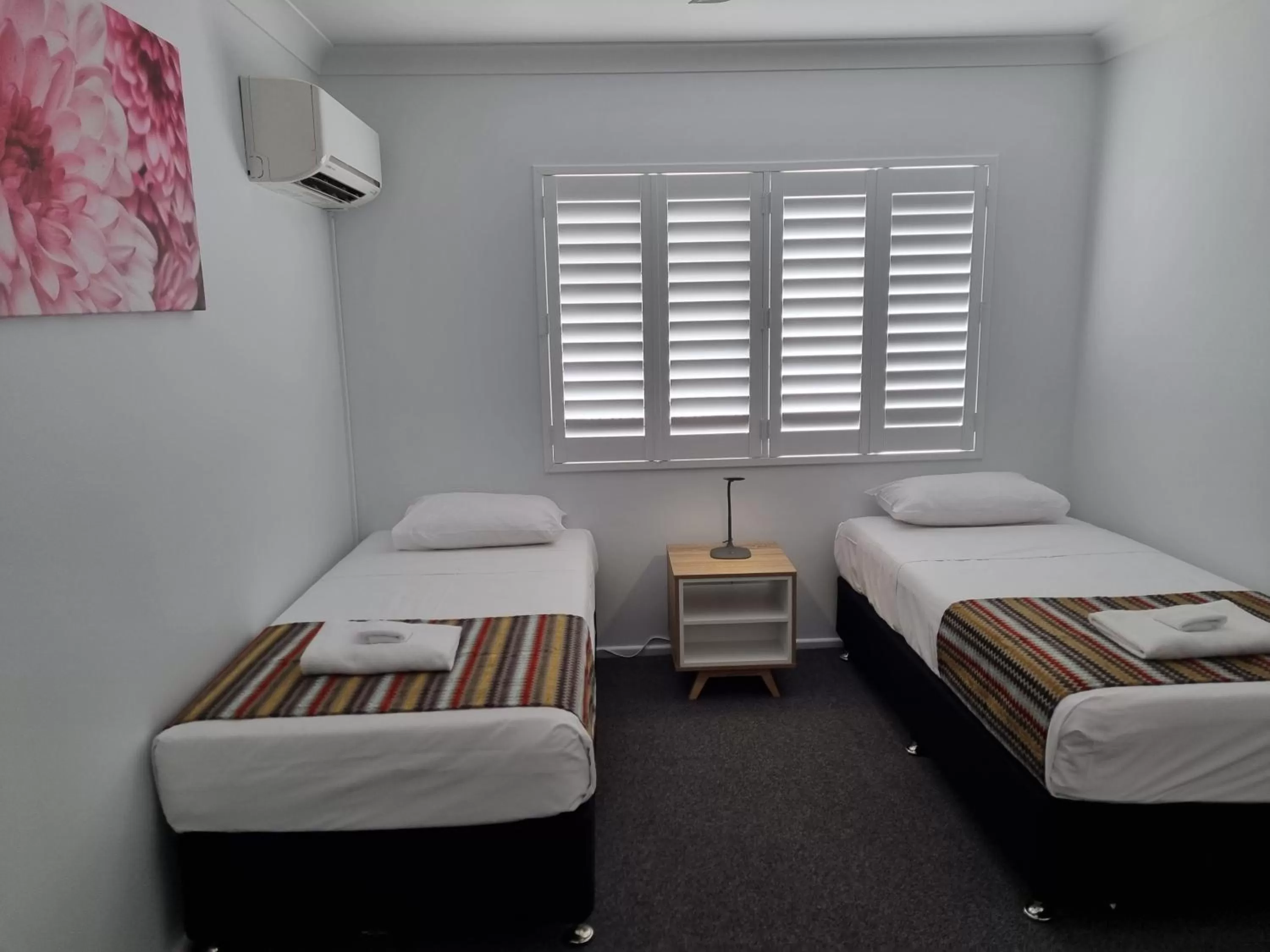 Bedroom, Bed in Rockhampton Serviced Apartments