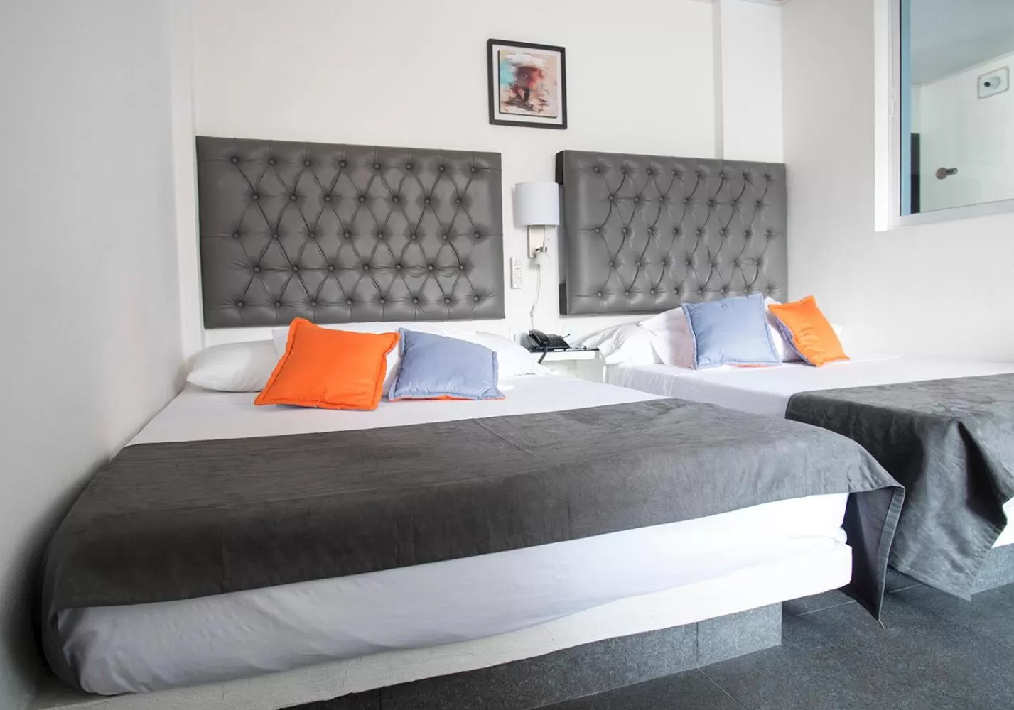 Bed in Hotel Grand H&R