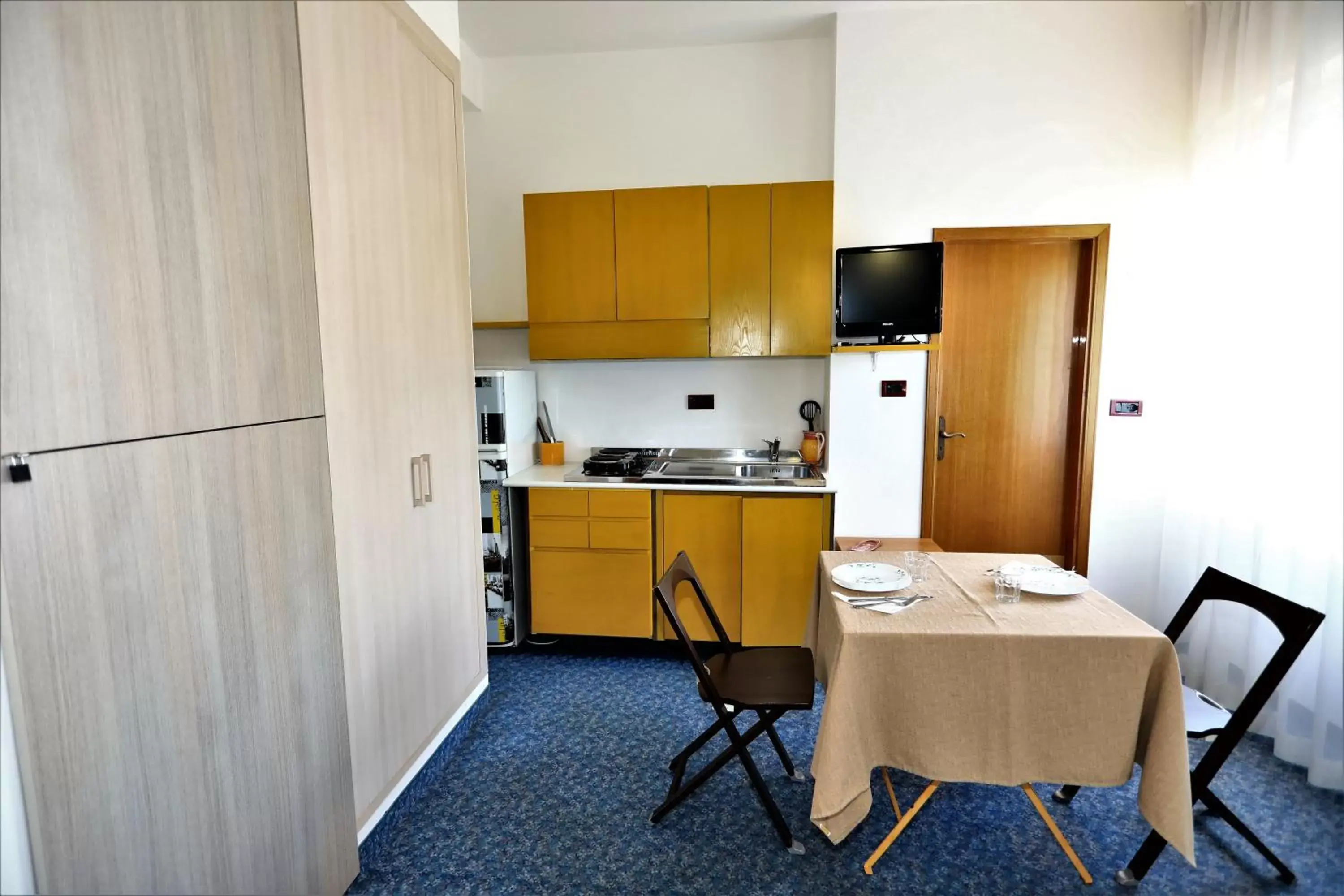 Kitchen/Kitchenette in Residence & Suites