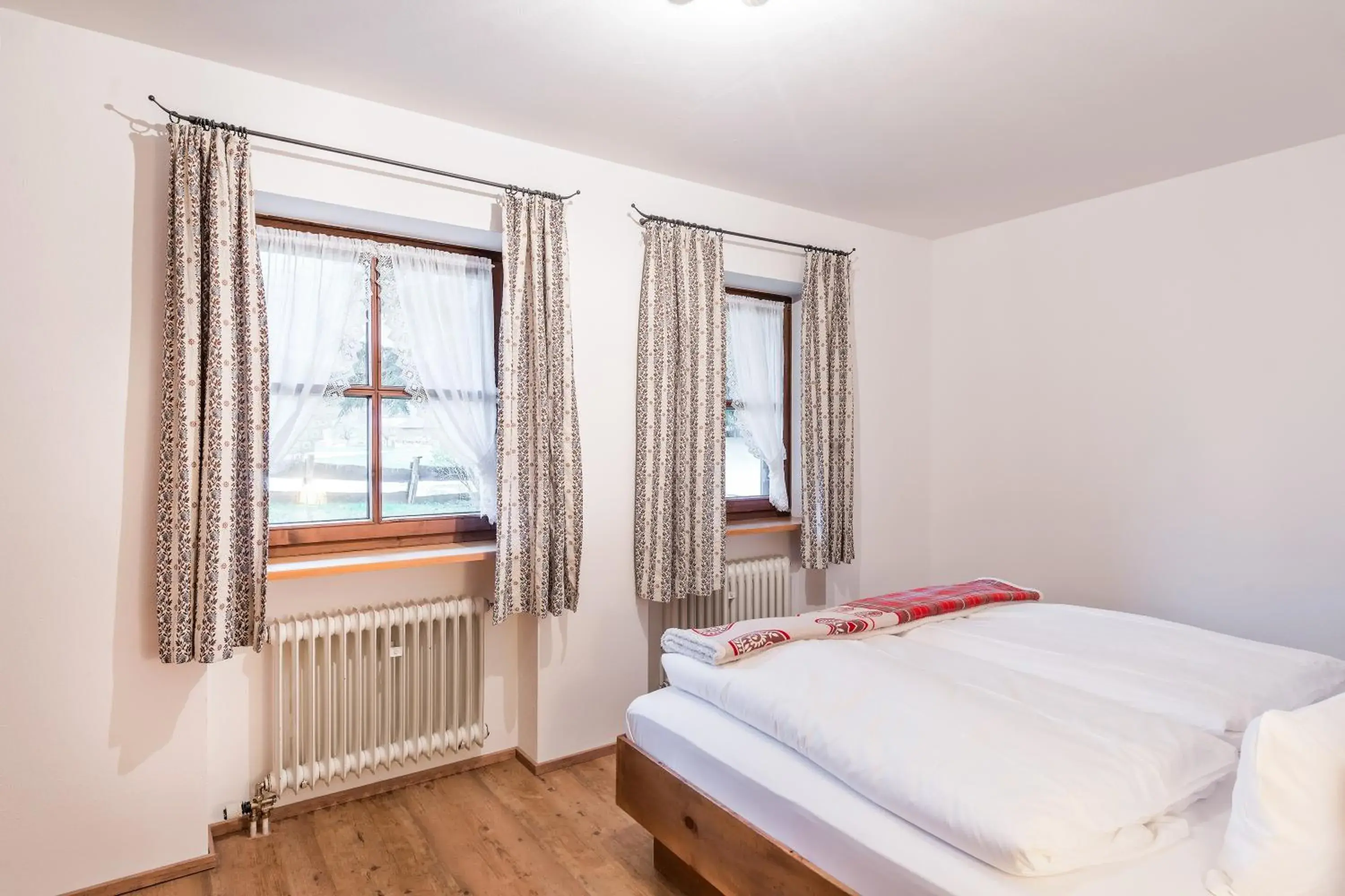 Photo of the whole room, Bed in Das Bergmayr - Chiemgauer Alpenhotel