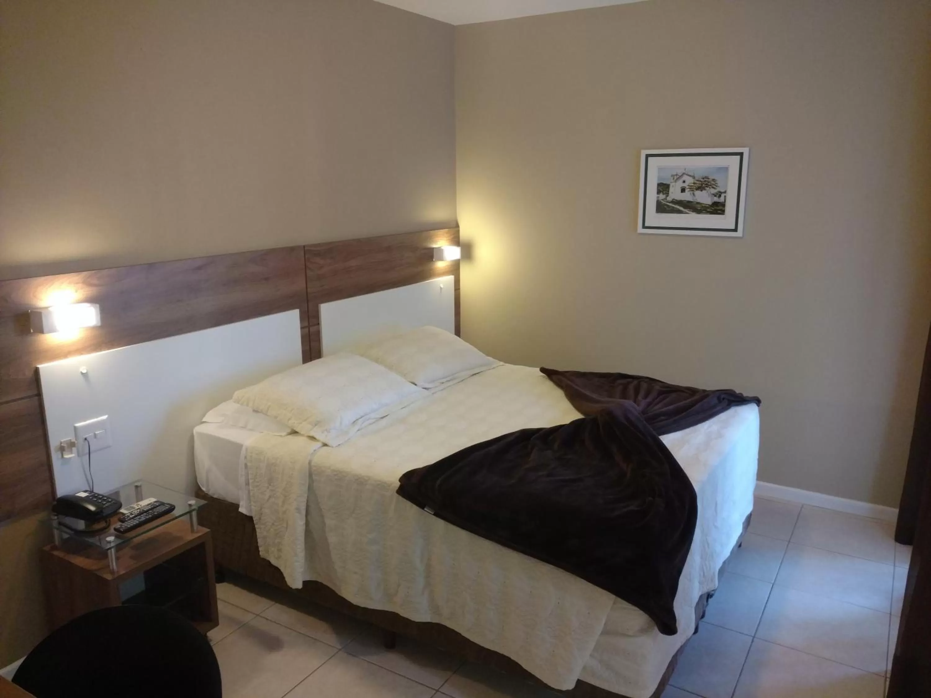 Bed in Brisamar Suite Hotel