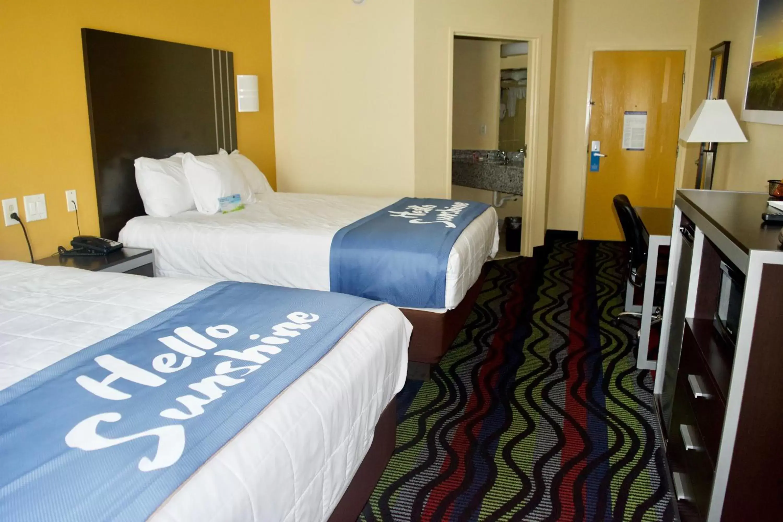 Photo of the whole room, Bed in Days Inn & Suites by Wyndham Augusta Near Fort Gordon