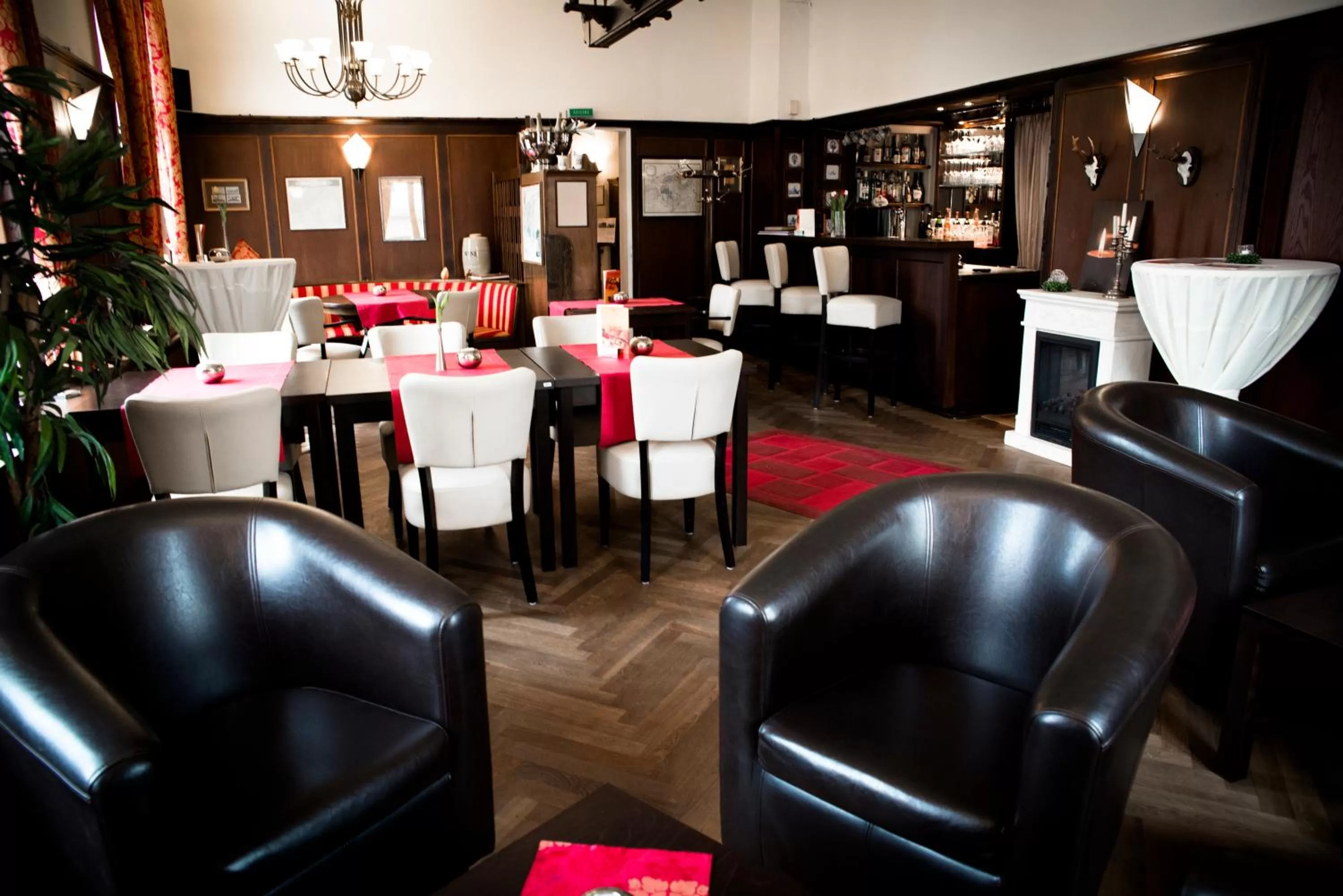 Communal lounge/ TV room in Heerens Hotel