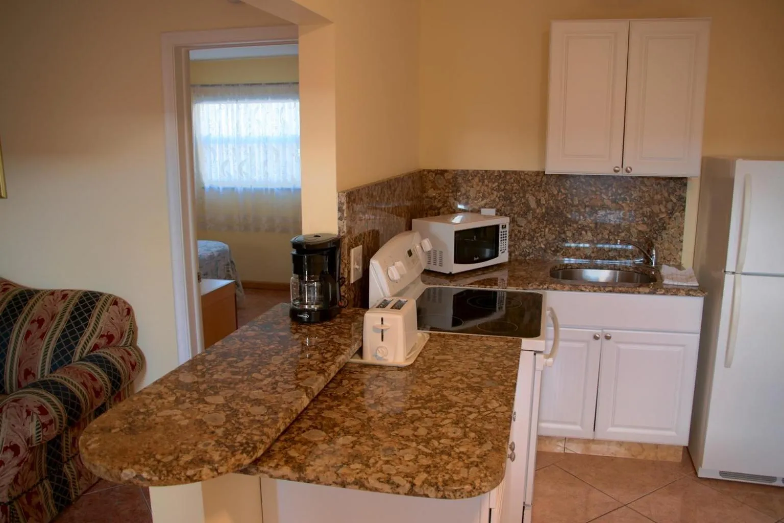 Kitchen or kitchenette in Lago Mar Motel and Apartments