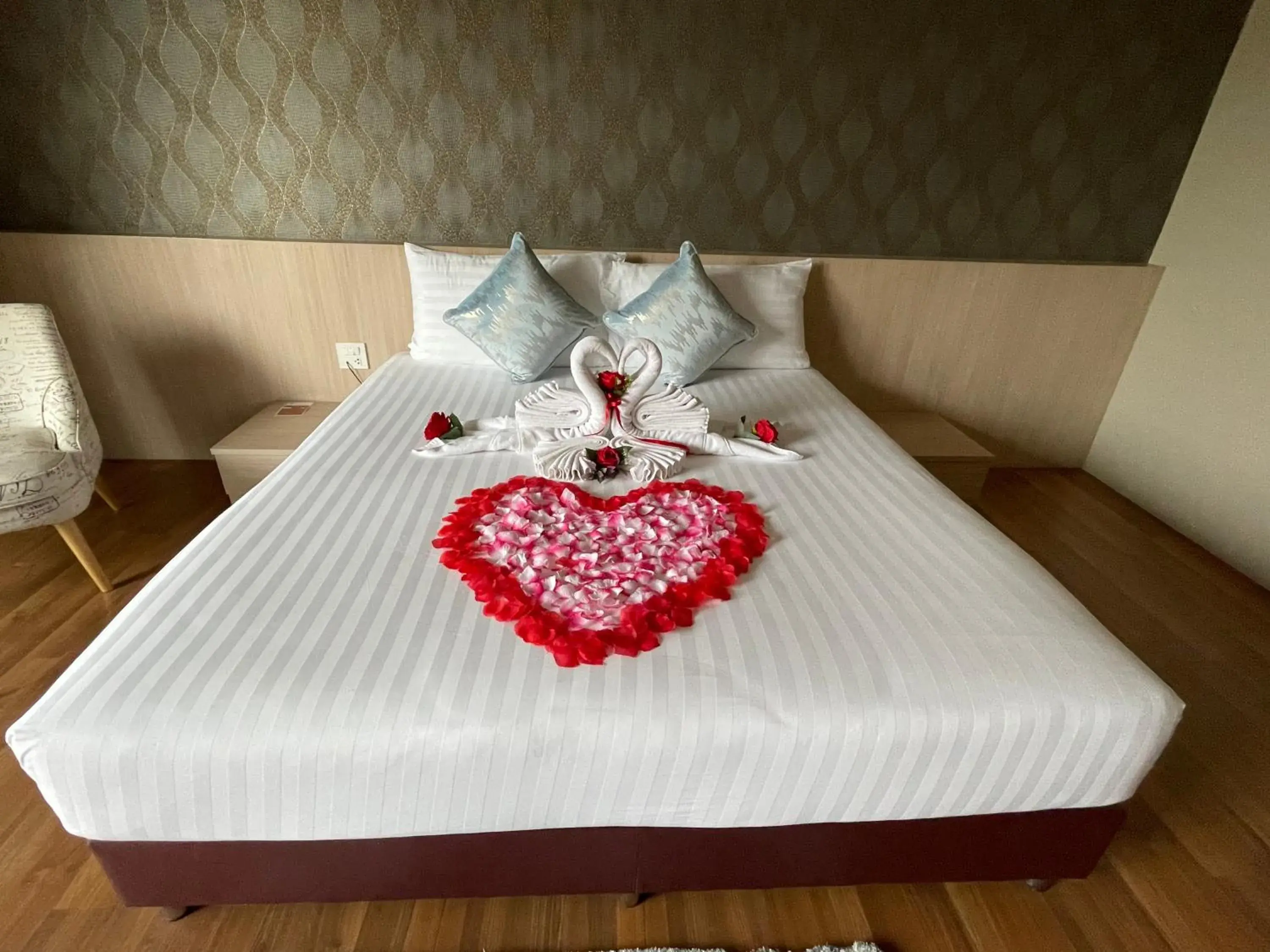 Bed in TONAOI GRAND HOTEL