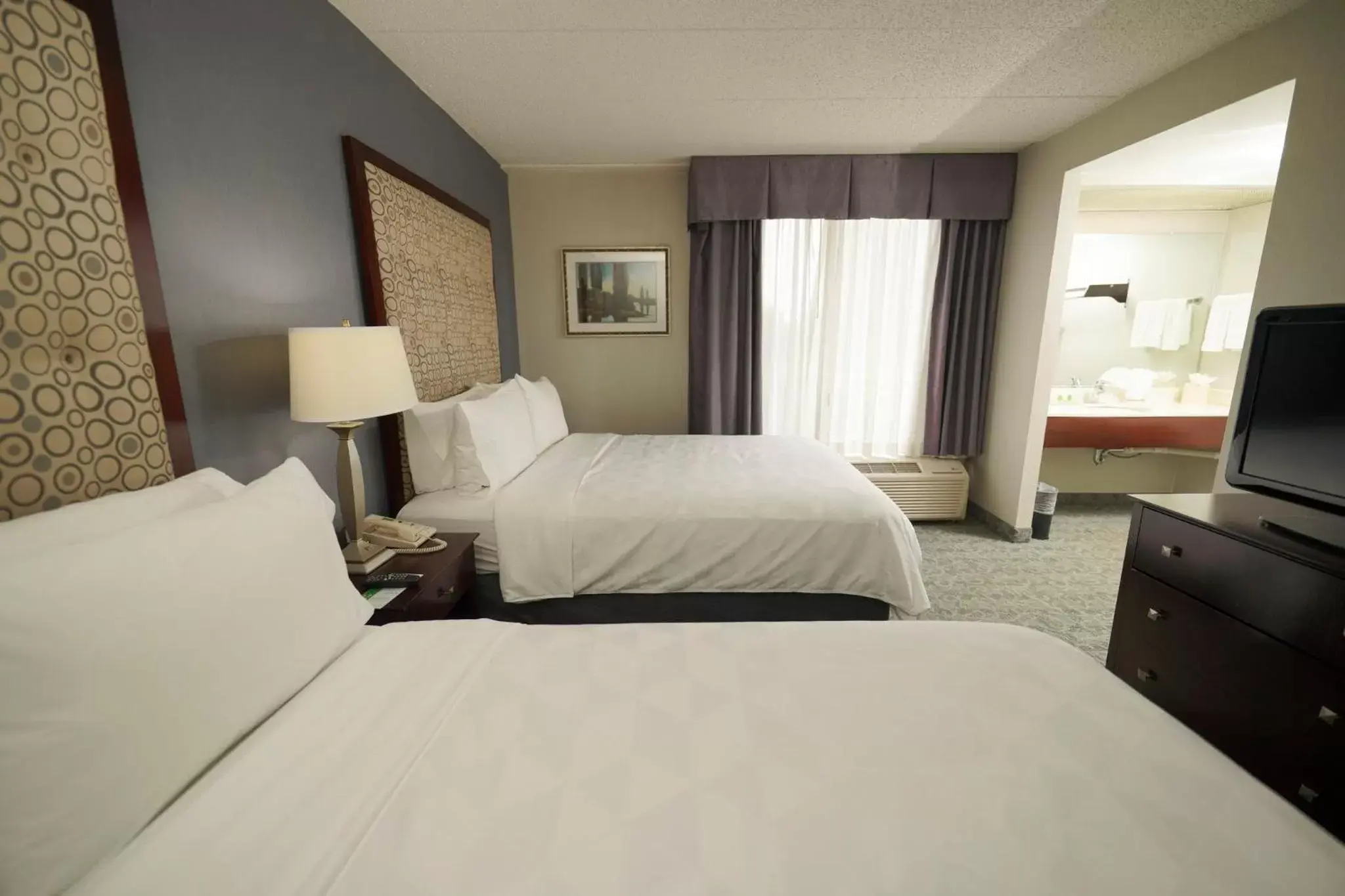 Photo of the whole room, Bed in Holiday Inn & Suites Chicago-Carol Stream Wheaton, an IHG Hotel