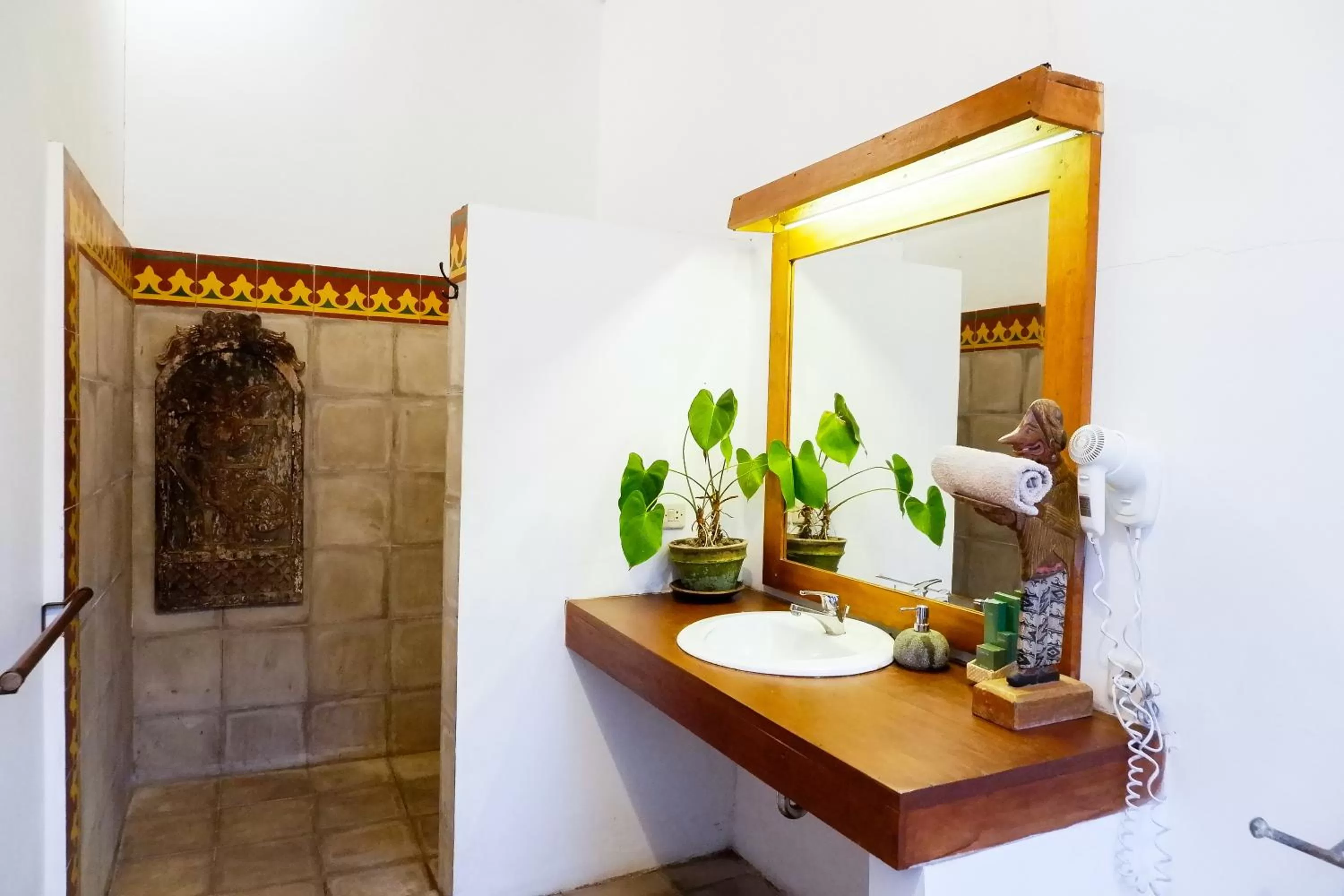 Bathroom in D'omah Yogya Hotel