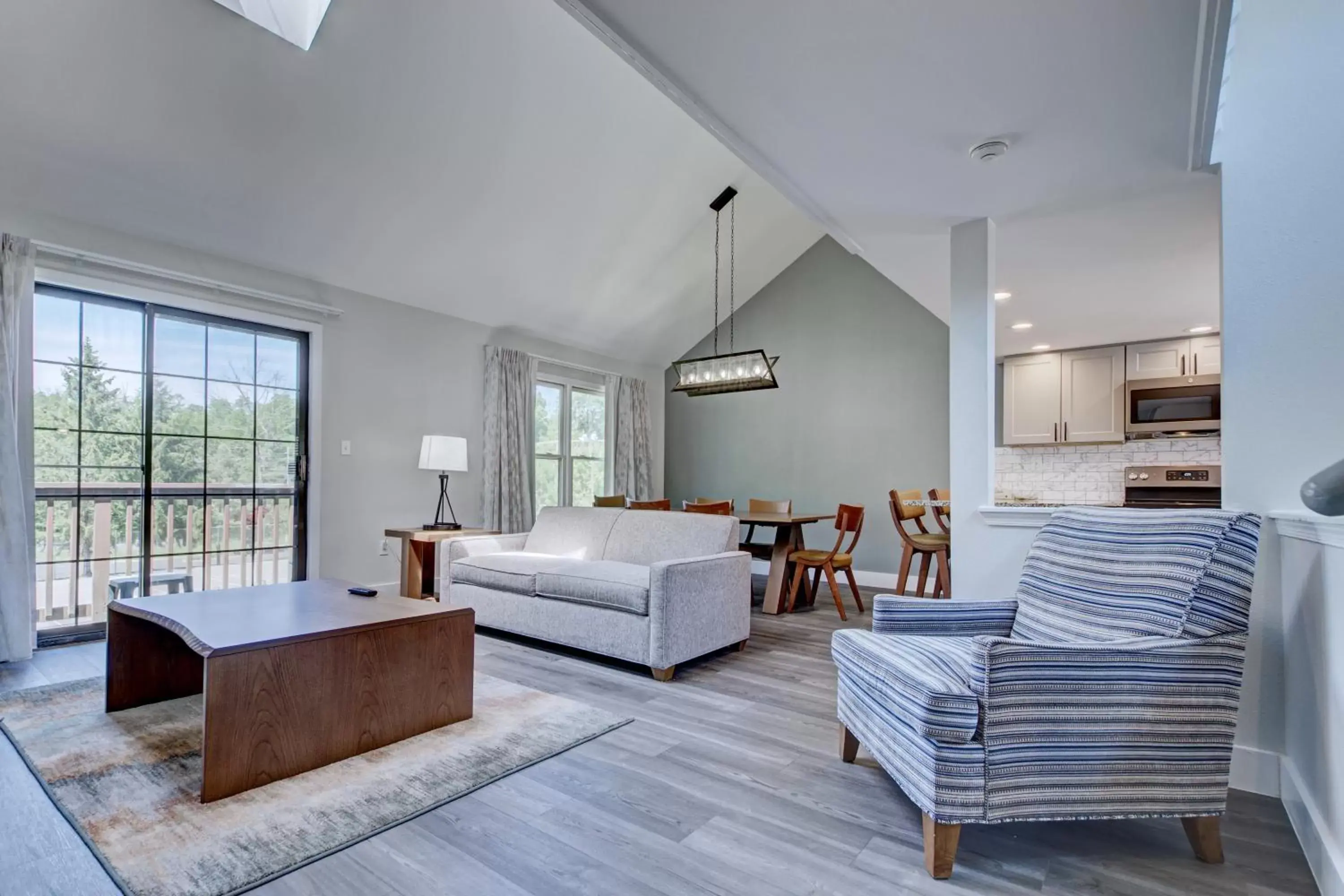 Living room in Pocono Mountain Villas by Exploria Resorts