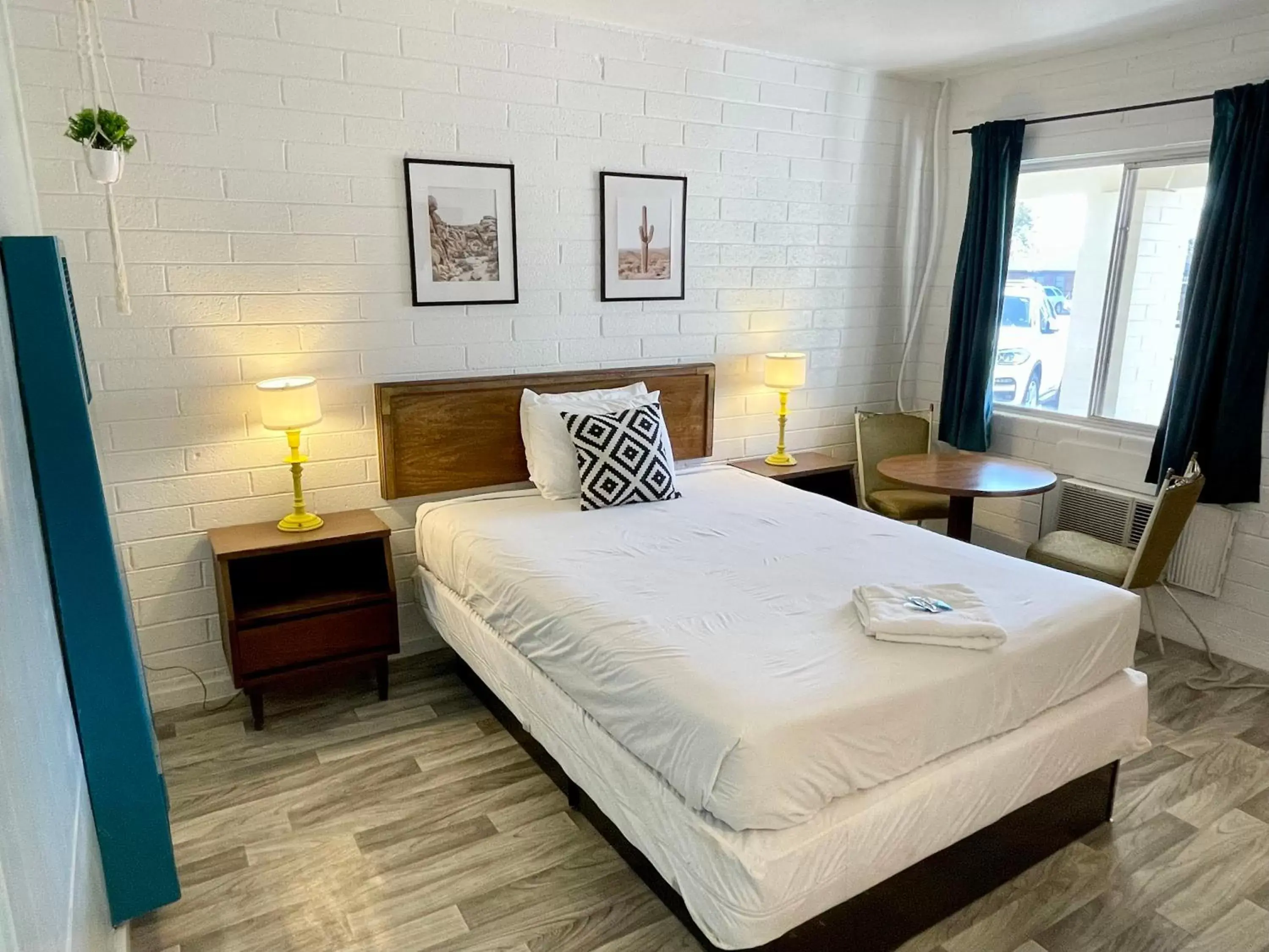 Bed in The Postcard Motel Bed in The Postcard Motel