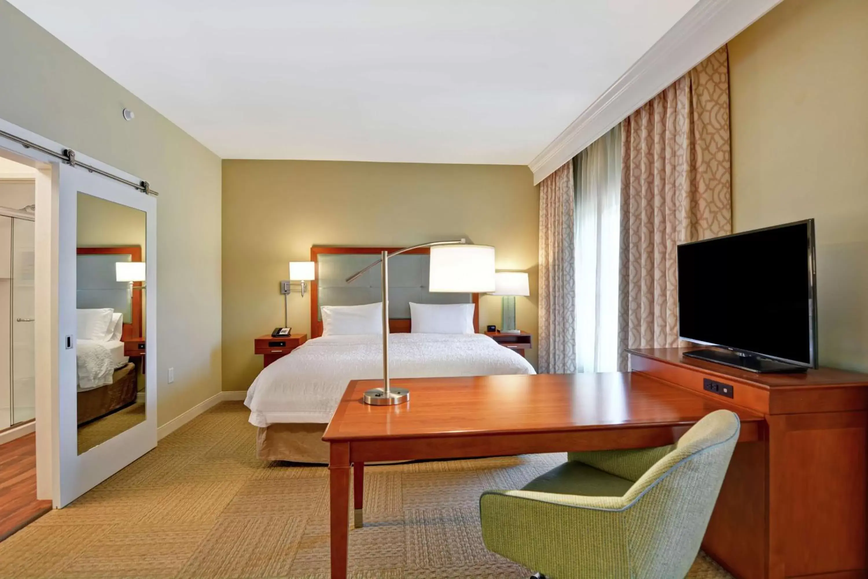 Photo of the whole room, TV/Entertainment Center in Hampton Inn & Suites Charleston Airport