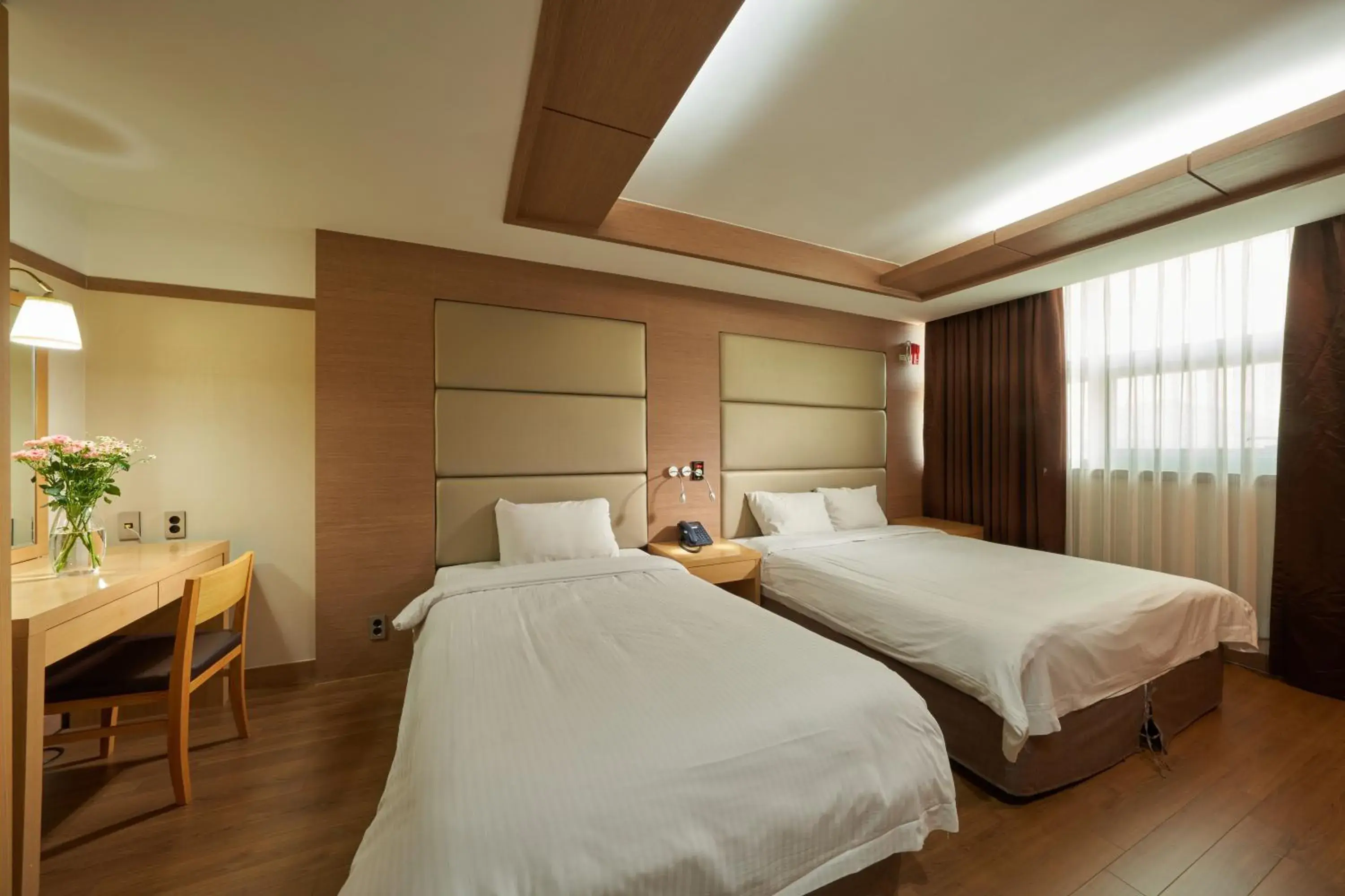 Bed in Gyeongju GG Tourist Hotel