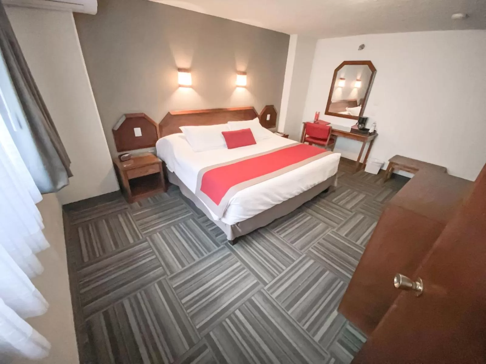 Bedroom, Bed in Ramada Plaza by Wyndham Leon