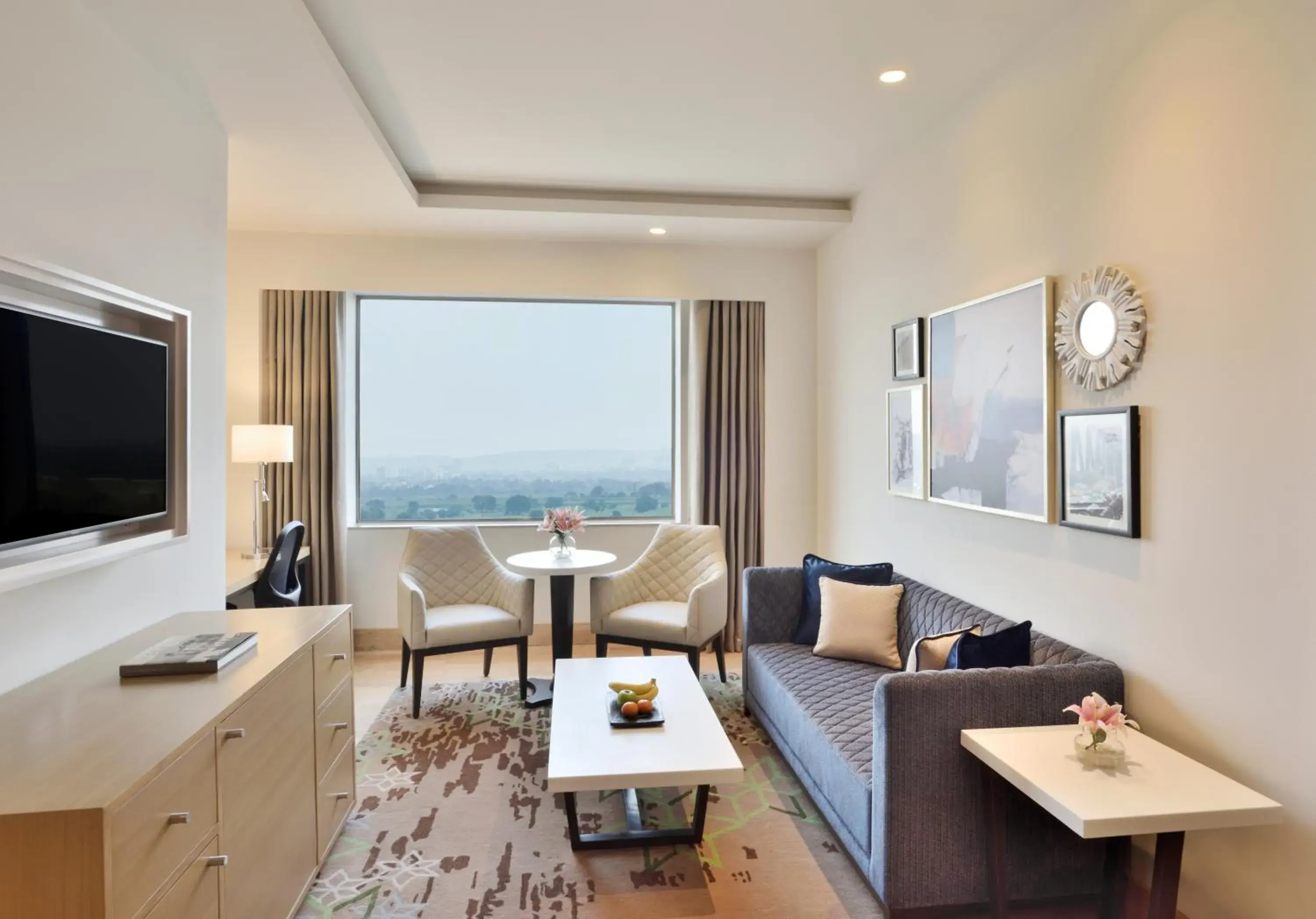 Living room, Seating Area in Radisson Gurugram Udyog Vihar