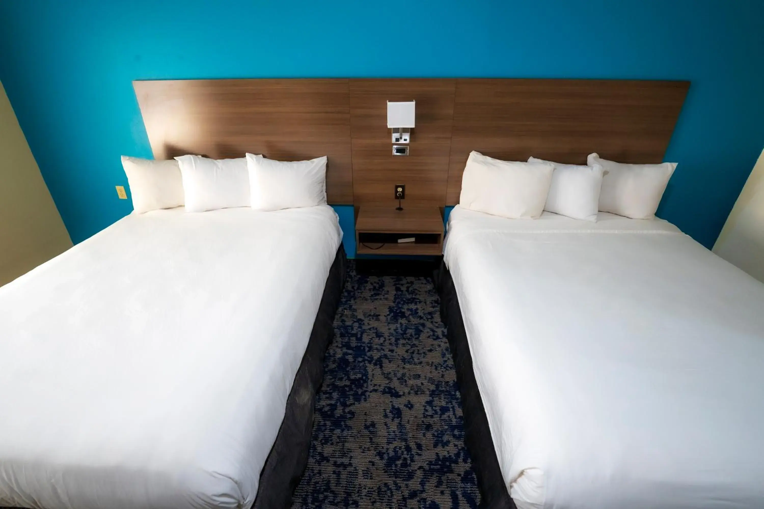 Bed in Quality Inn & Suites Bed in Quality Inn & Suites