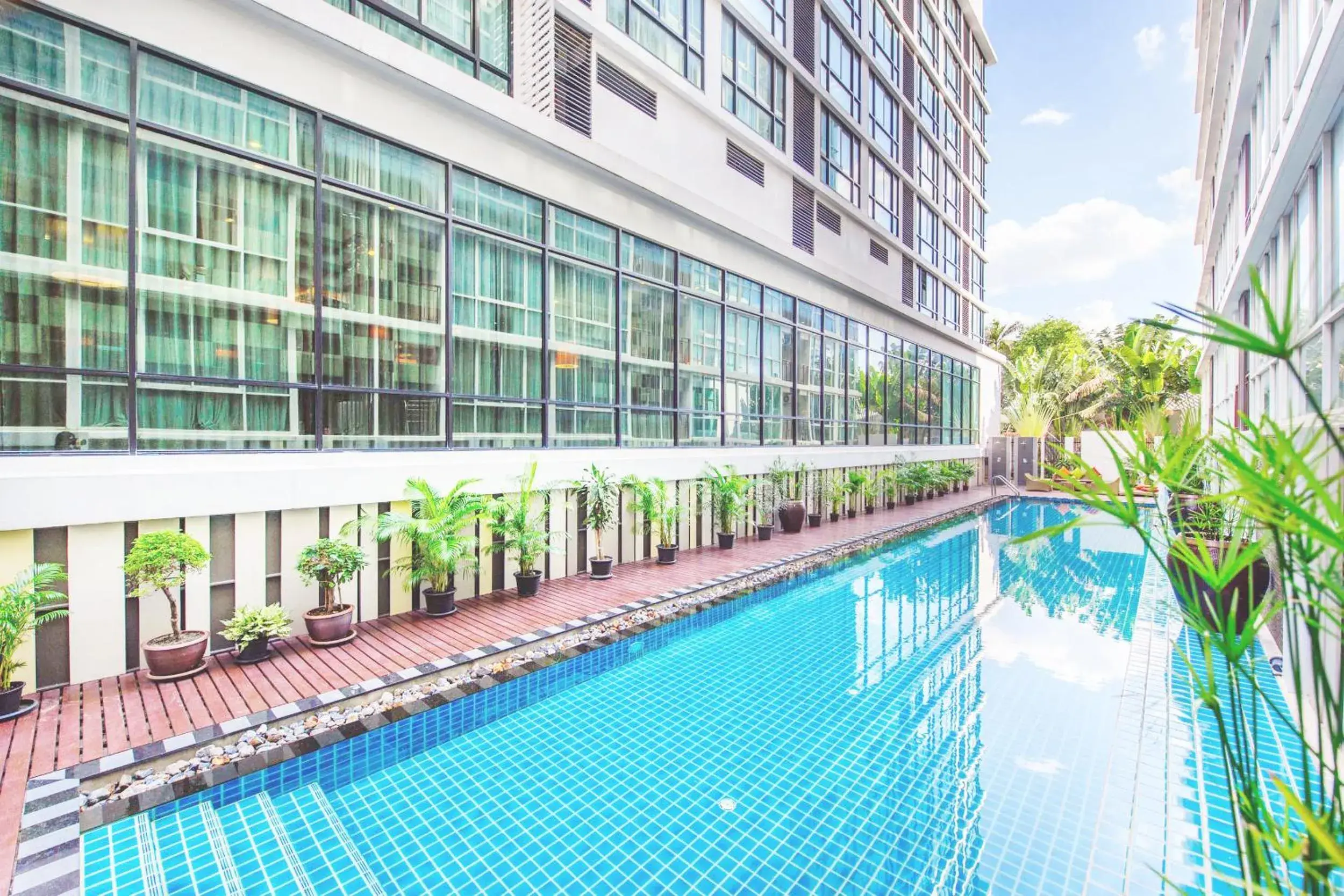 Property building, Swimming Pool in Mida Hotel Ngamwongwan - SHA Plus