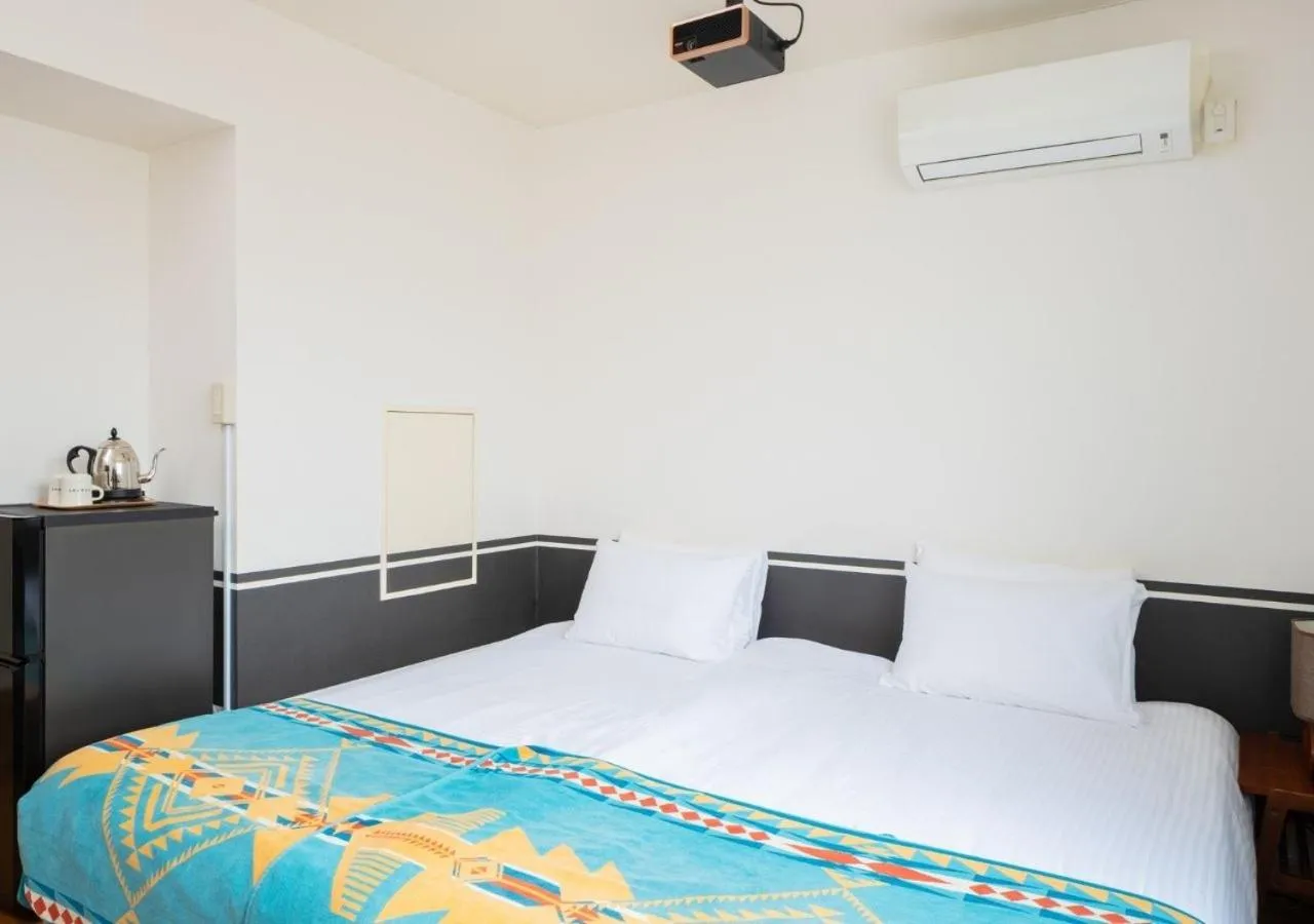 TV and multimedia, Bed in Hotel Graphy Nezu