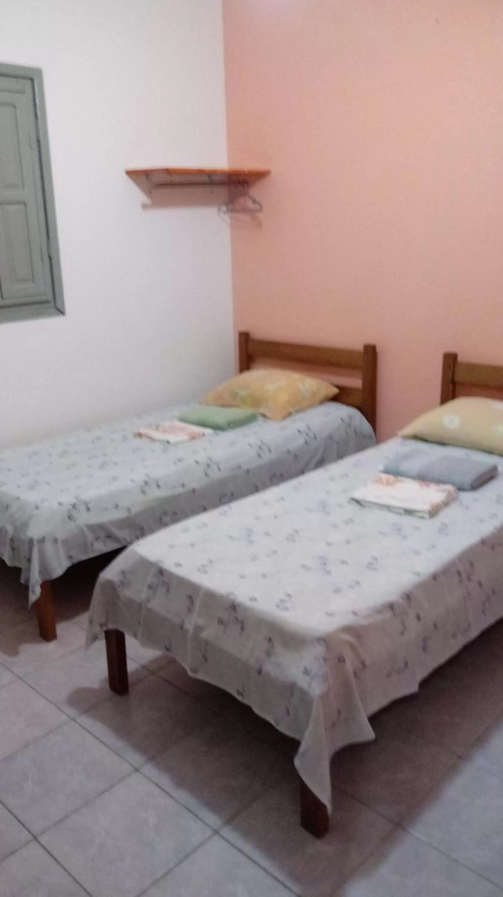 Bed in Pousada dos Ventos