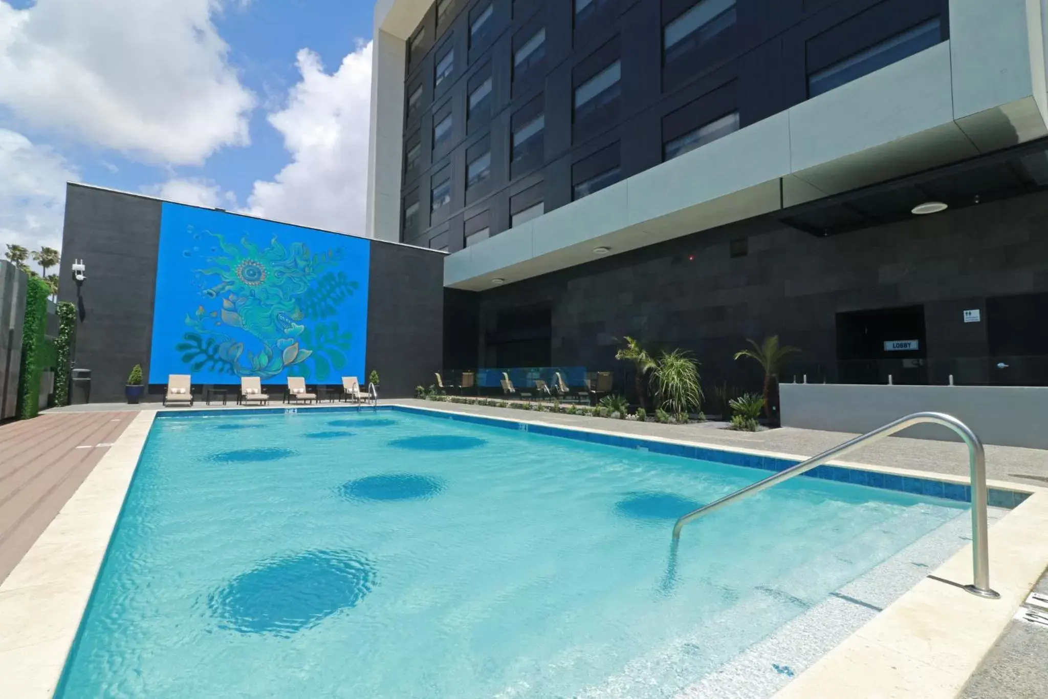 Swimming pool in Holiday Inn Express & Suites - Ensenada Centro by IHG Swimming pool in Holiday Inn Express & Suites - Ensenada Centro by IHG