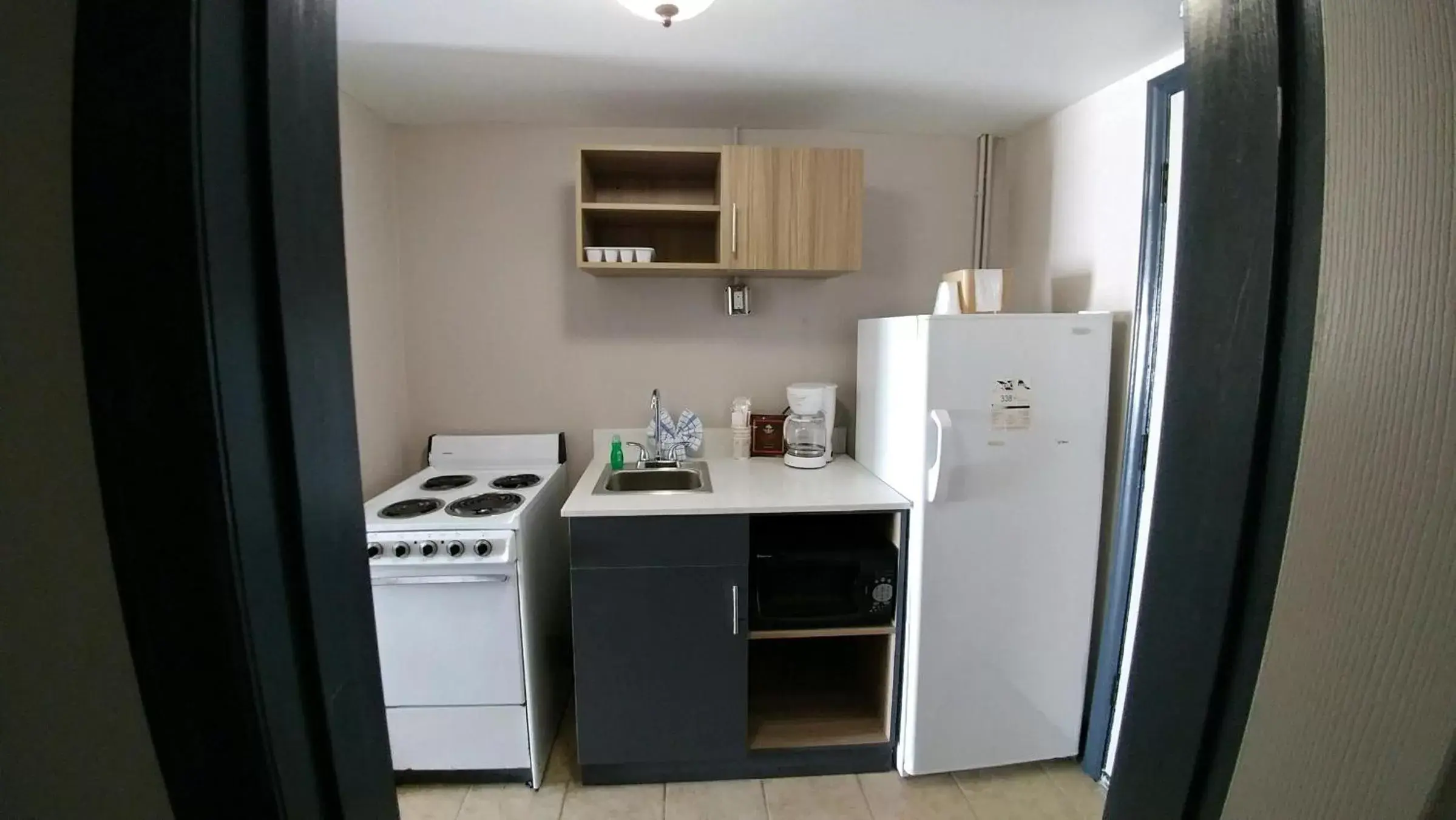 Kitchen or kitchenette in Garden City Inn Kitchen or kitchenette in Garden City Inn