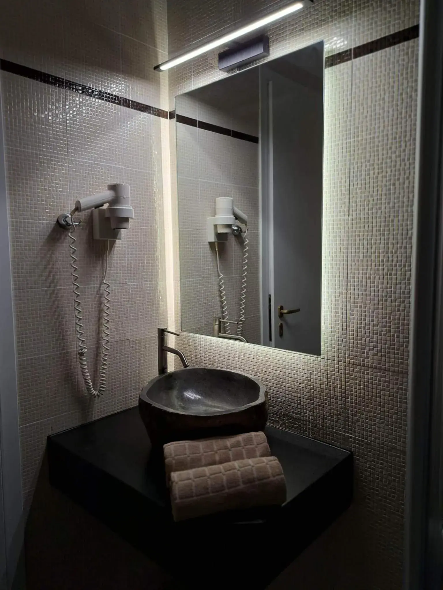 Bathroom in Amerisa Suites