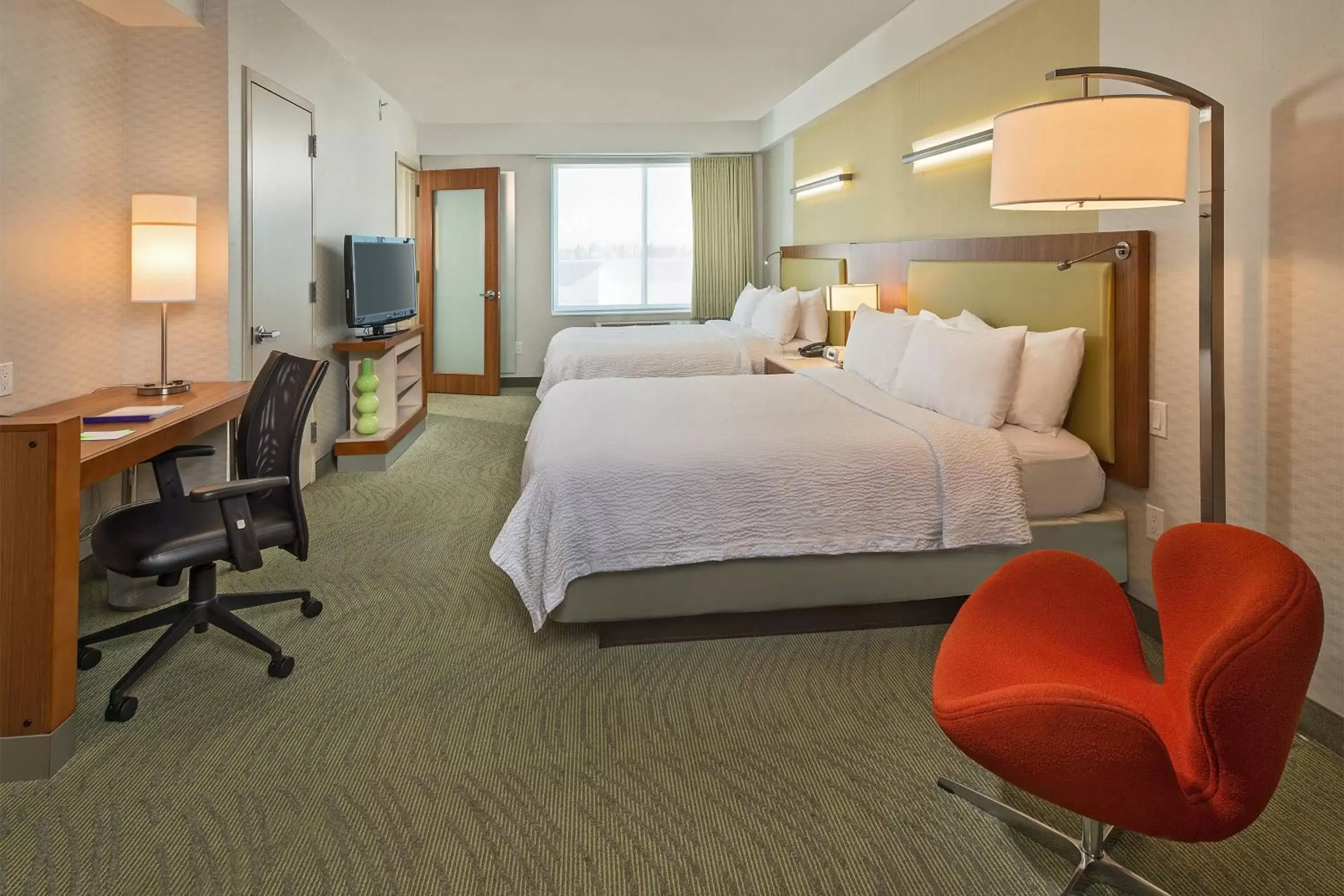 Photo of the whole room in SpringHill Suites by Marriott New York LaGuardia Airport