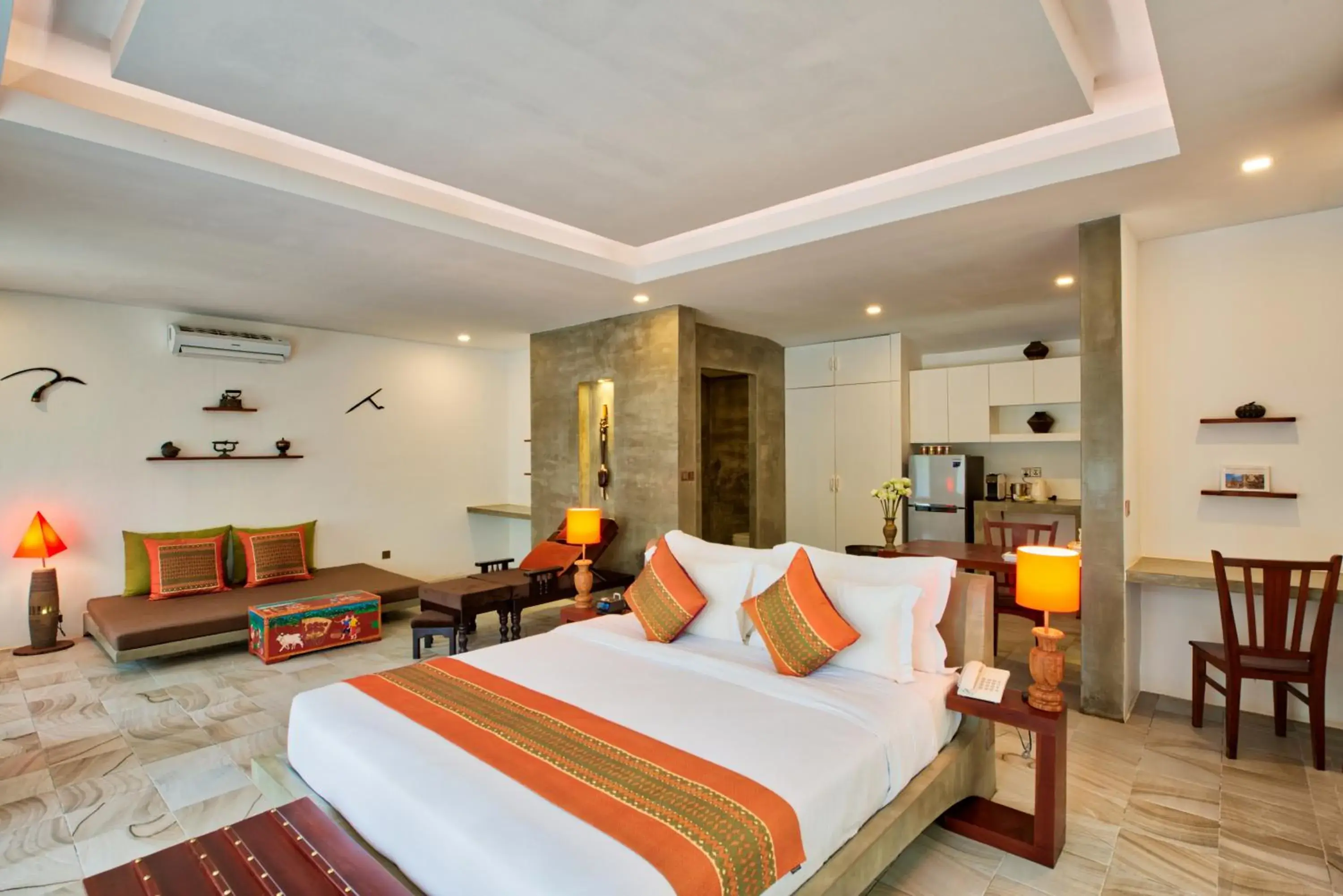 Bed in Mane Village Suites