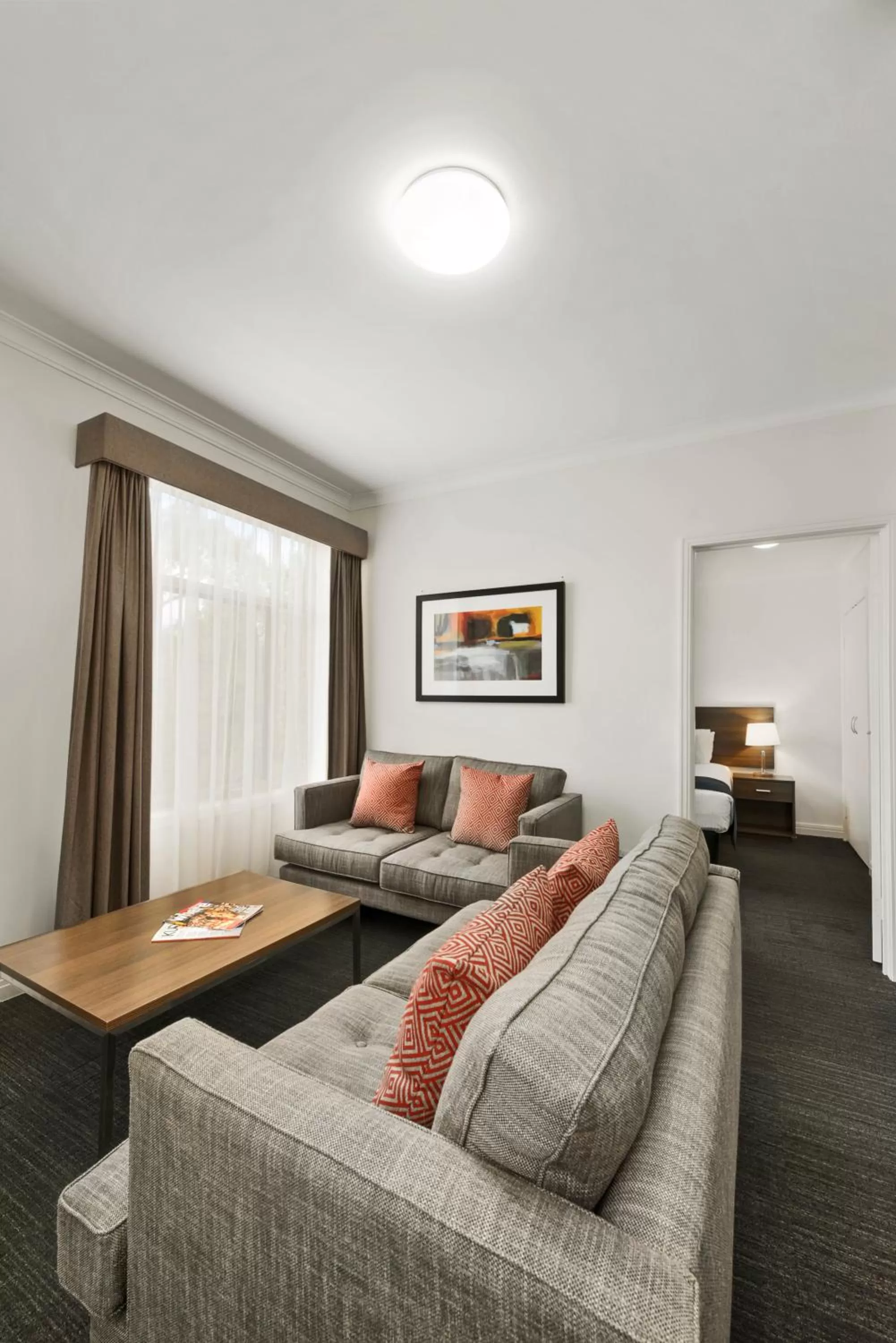 Living room, Bed in Quest Dandenong
