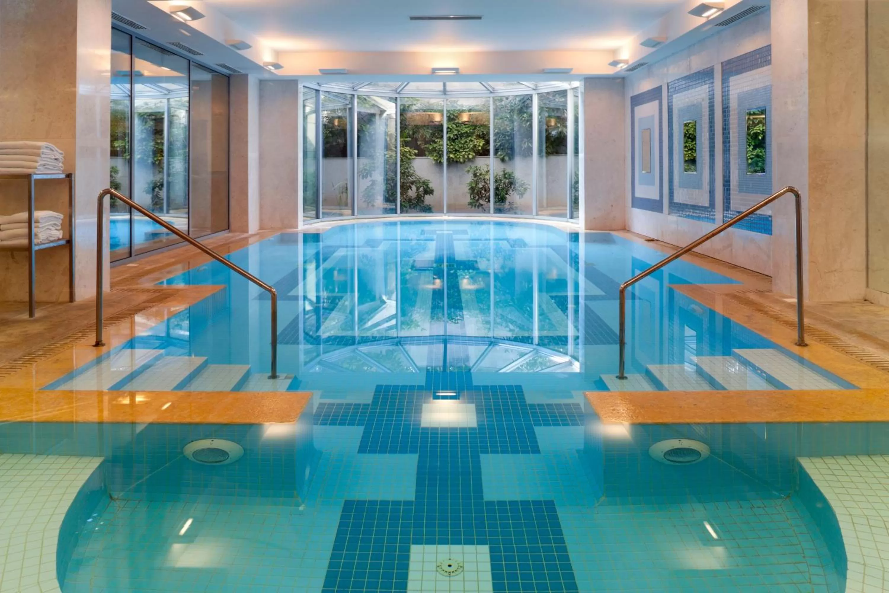 Swimming pool in Holiday Inn Athens Attica Av, Airport W. by IHG