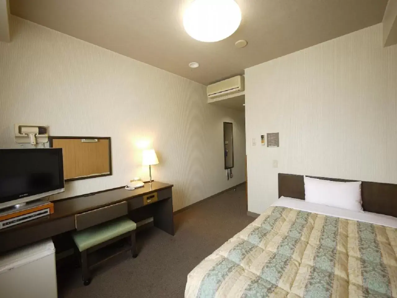 Bed in Hotel Route-Inn Court Minami Matsumoto