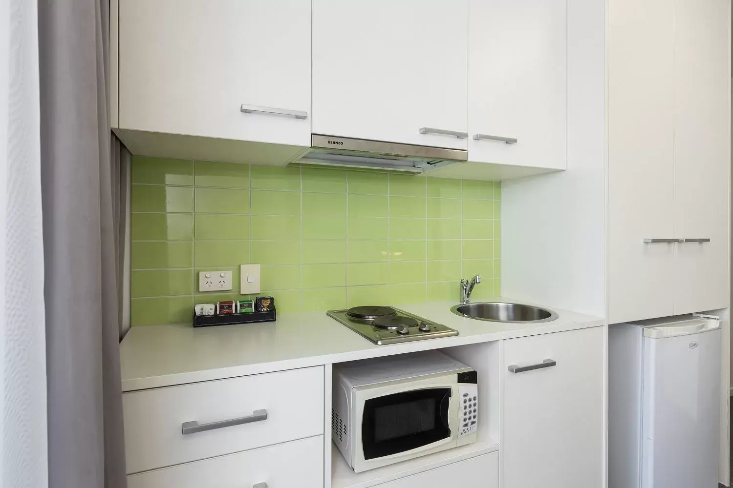 Kitchen or kitchenette, Kitchen/Kitchenette in City Edge North Melbourne Apartment Hotel