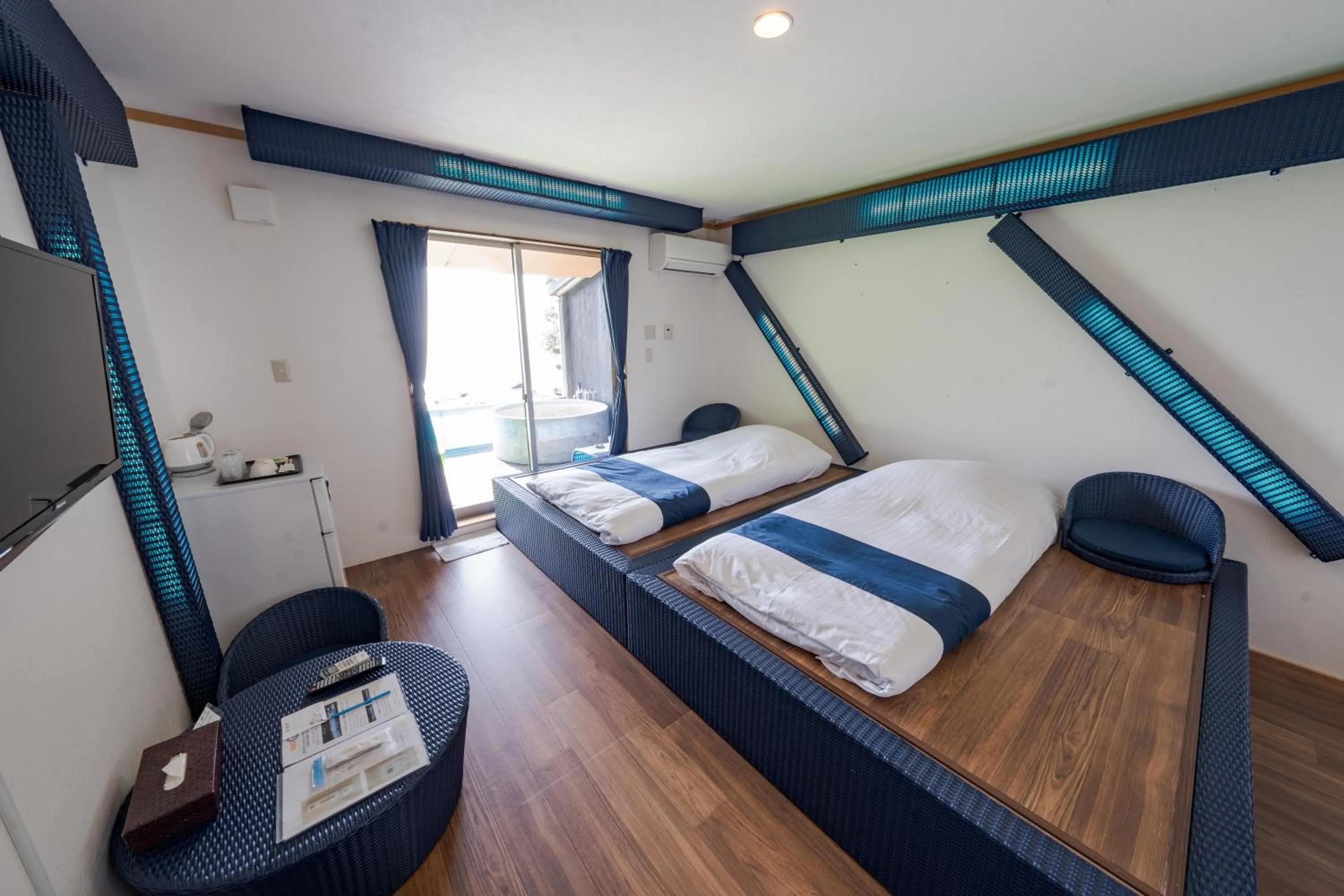 Bed in XYZ Private Spa and Seaside Resort