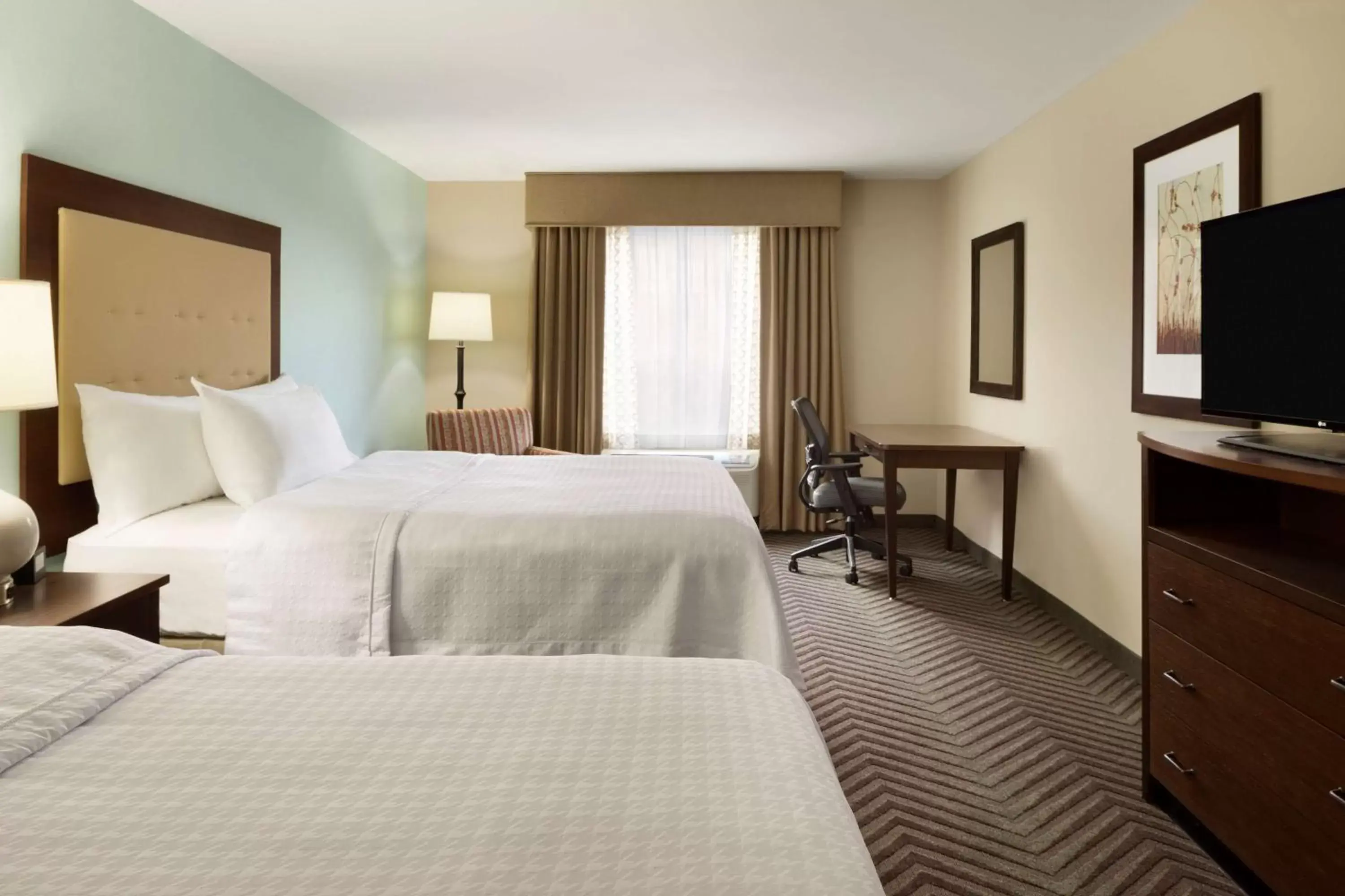 Bed in Homewood Suites by Hilton Kalamazoo-Portage