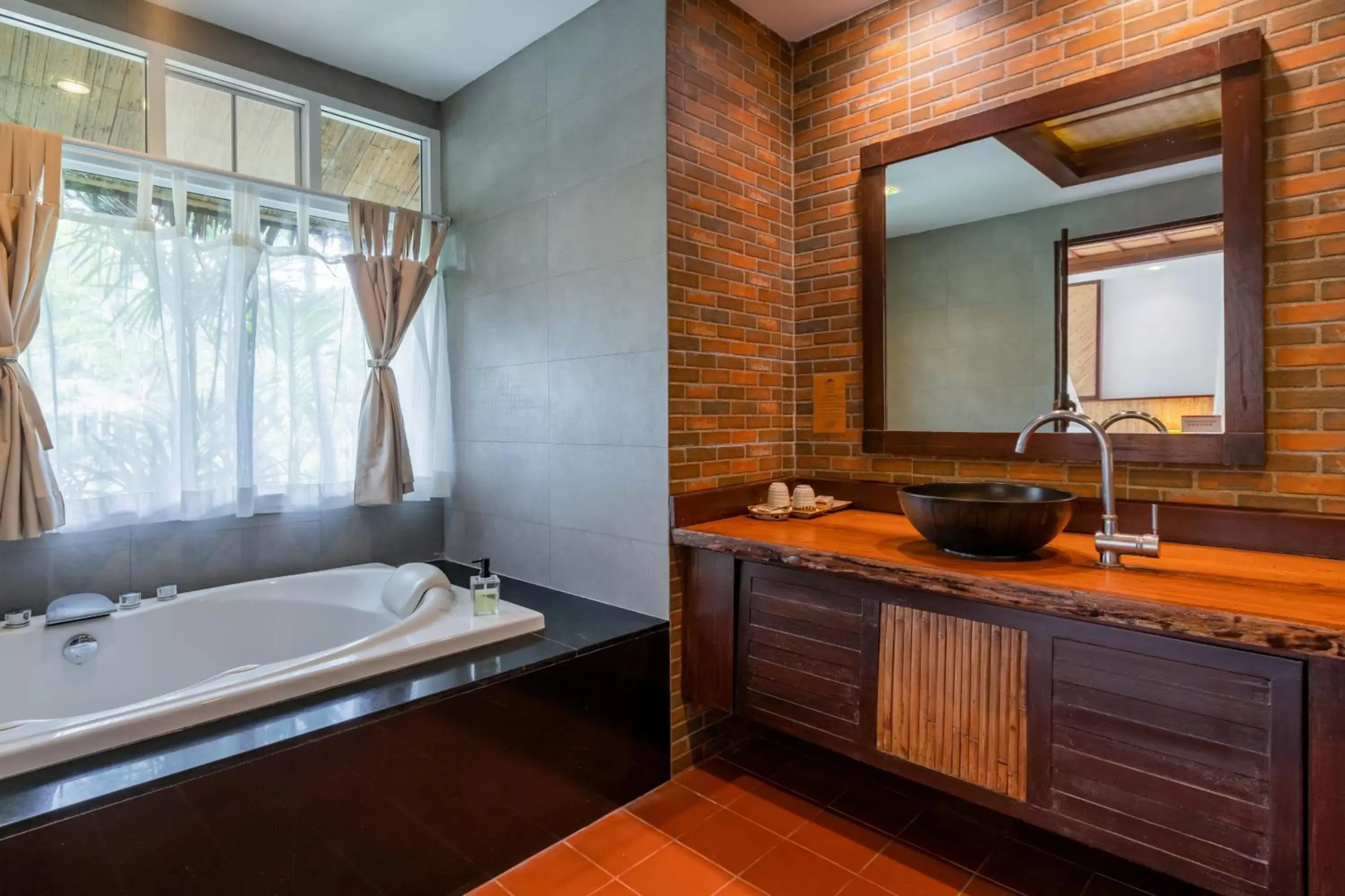 Bathroom in Ban Sainai Resort- SHA Extra Plus Aonang's Green Resort