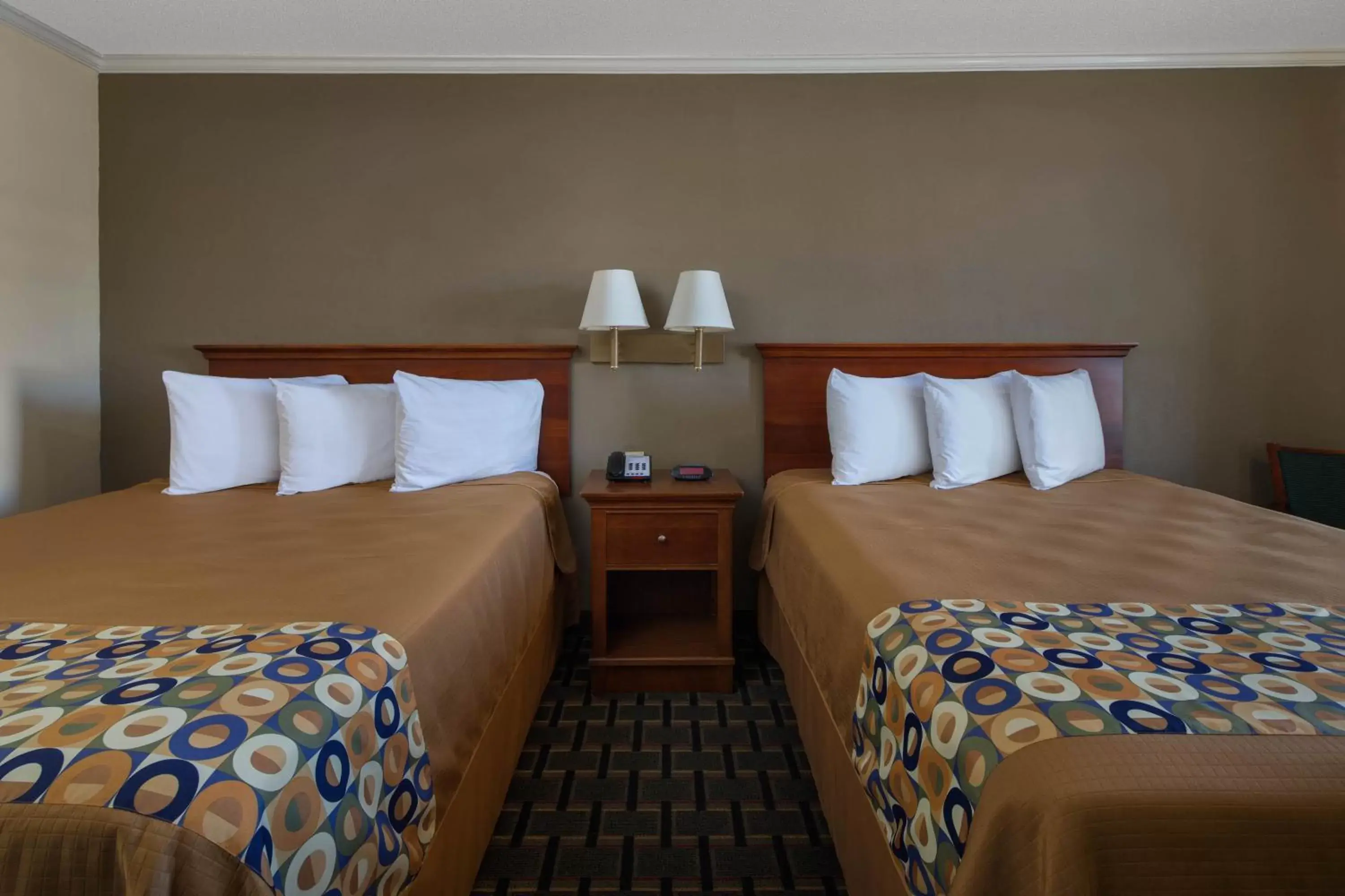Bed in Travelodge by Wyndham Orangeburg