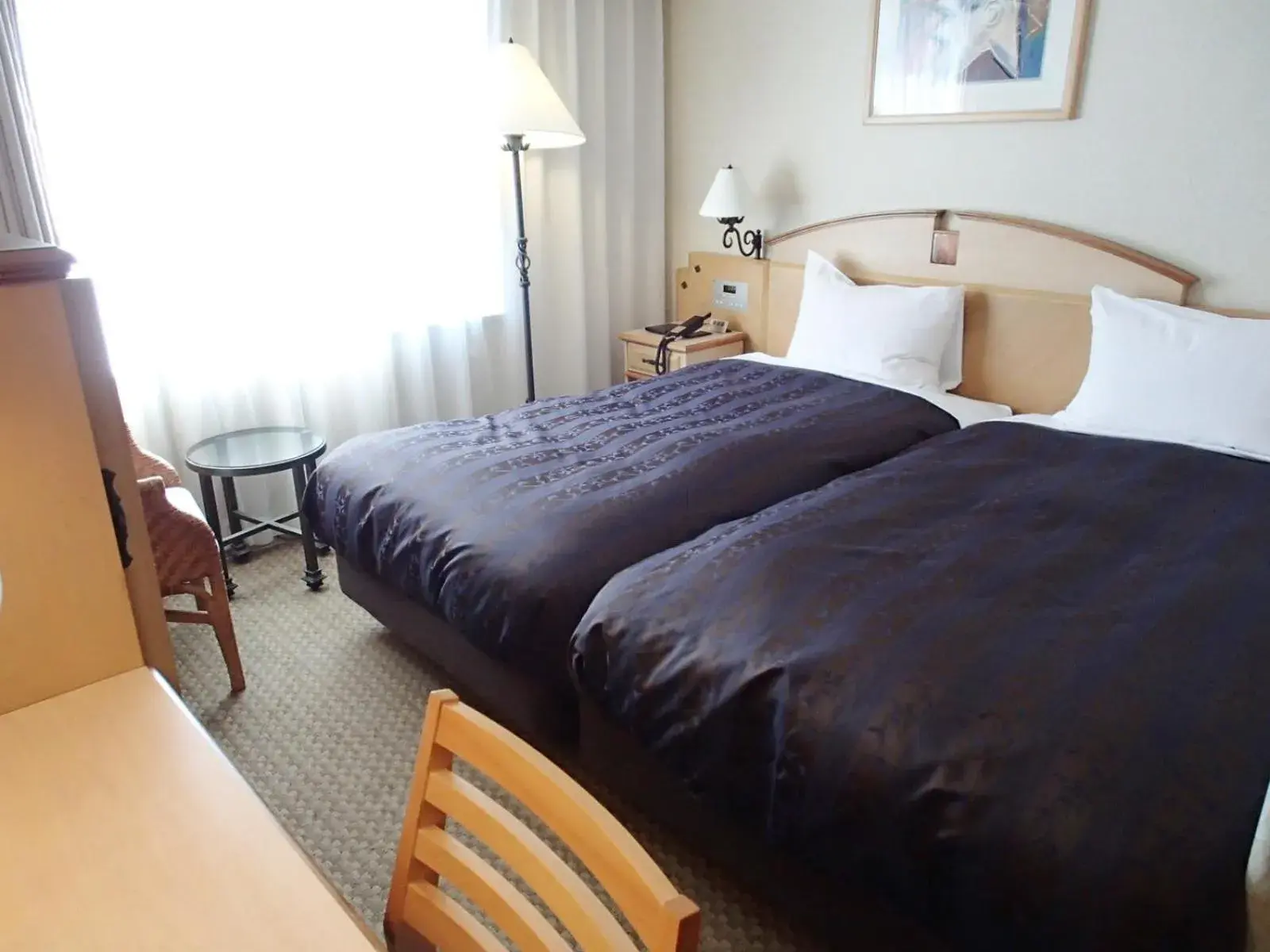 Photo of the whole room, Bed in Hotel Resol Sapporo Nakajima Koen