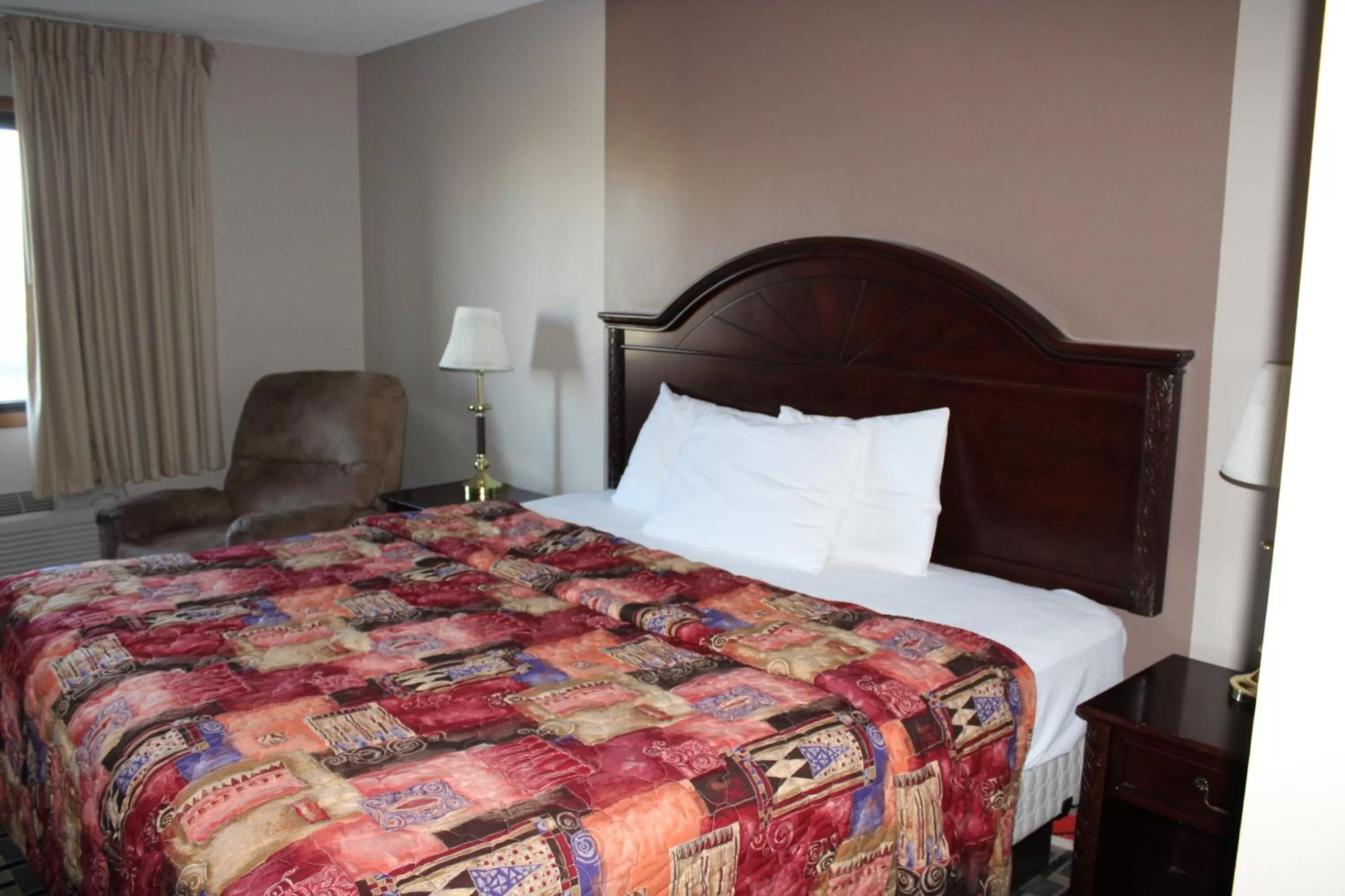 Bedroom, Bed in Coratel Inn and Suites Maple Grove