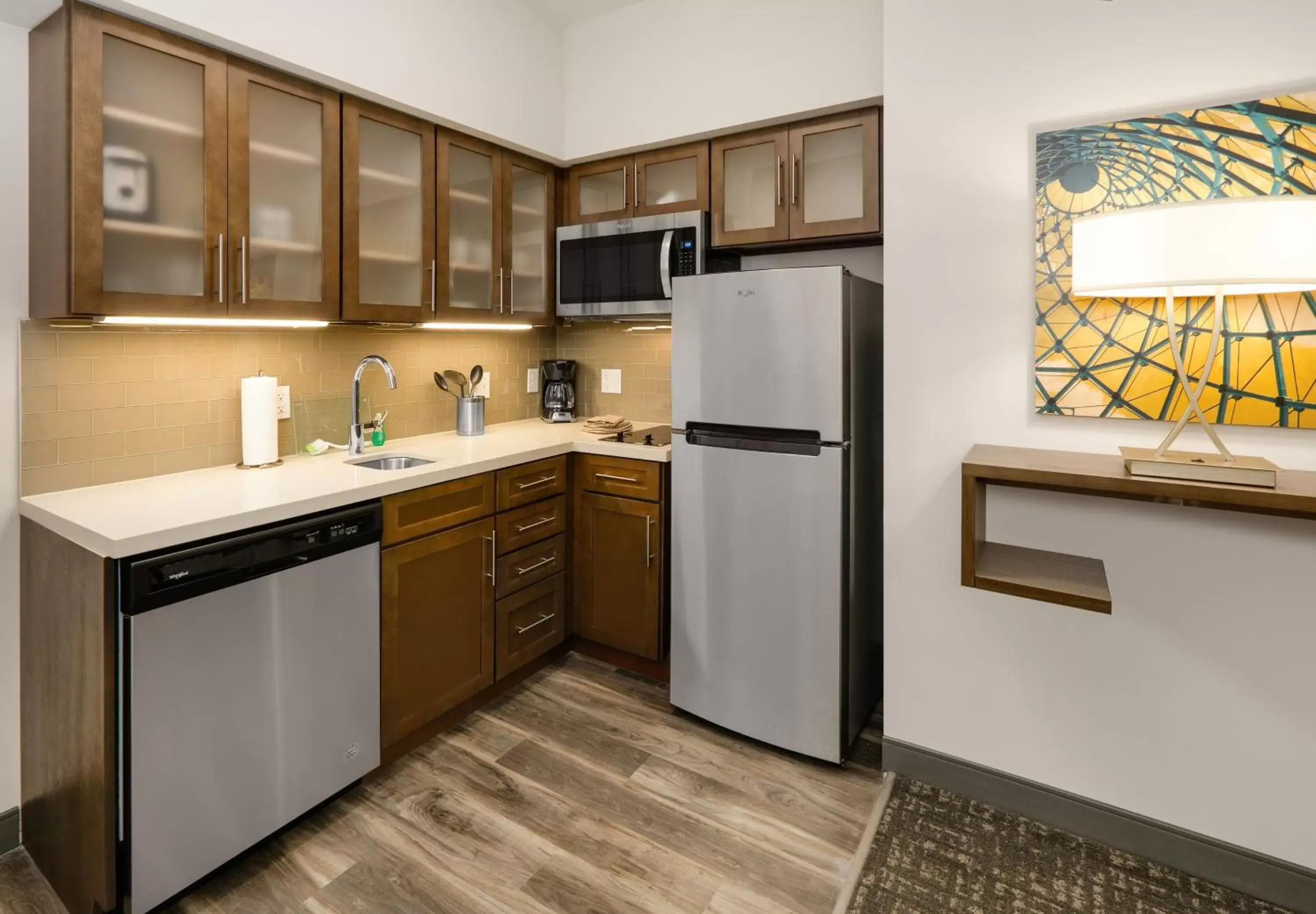 Bedroom, Kitchen/Kitchenette in Staybridge Suites - Oklahoma City - Downtown, an IHG Hotel