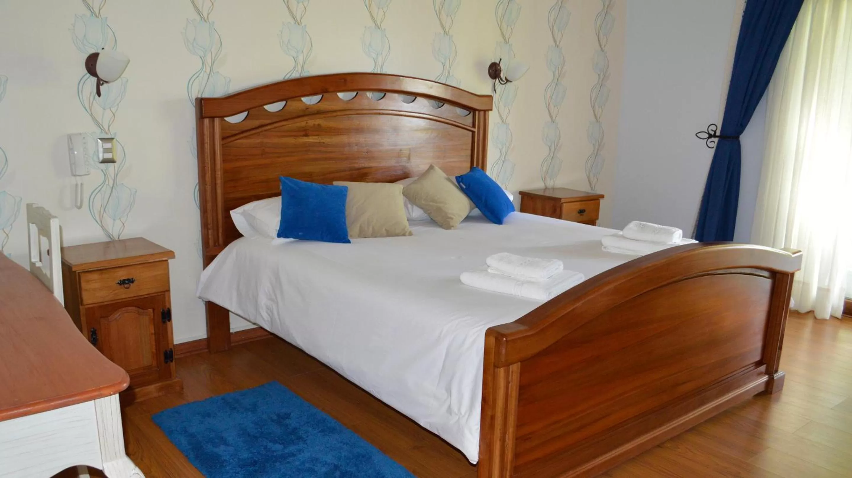 Bed in La Perla Hotel