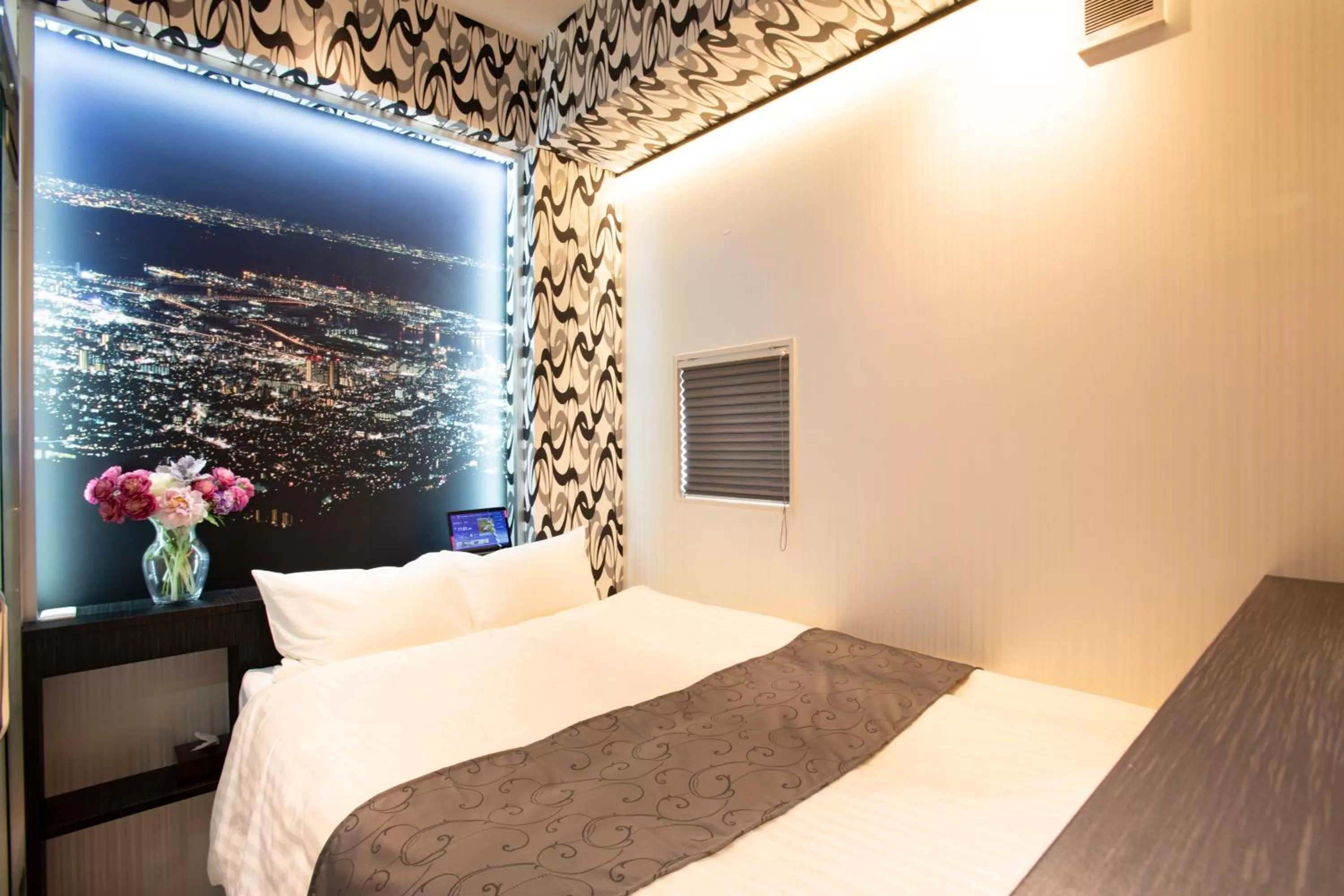 Bed in Hotel Xcell Hiroshima Nagarekawa