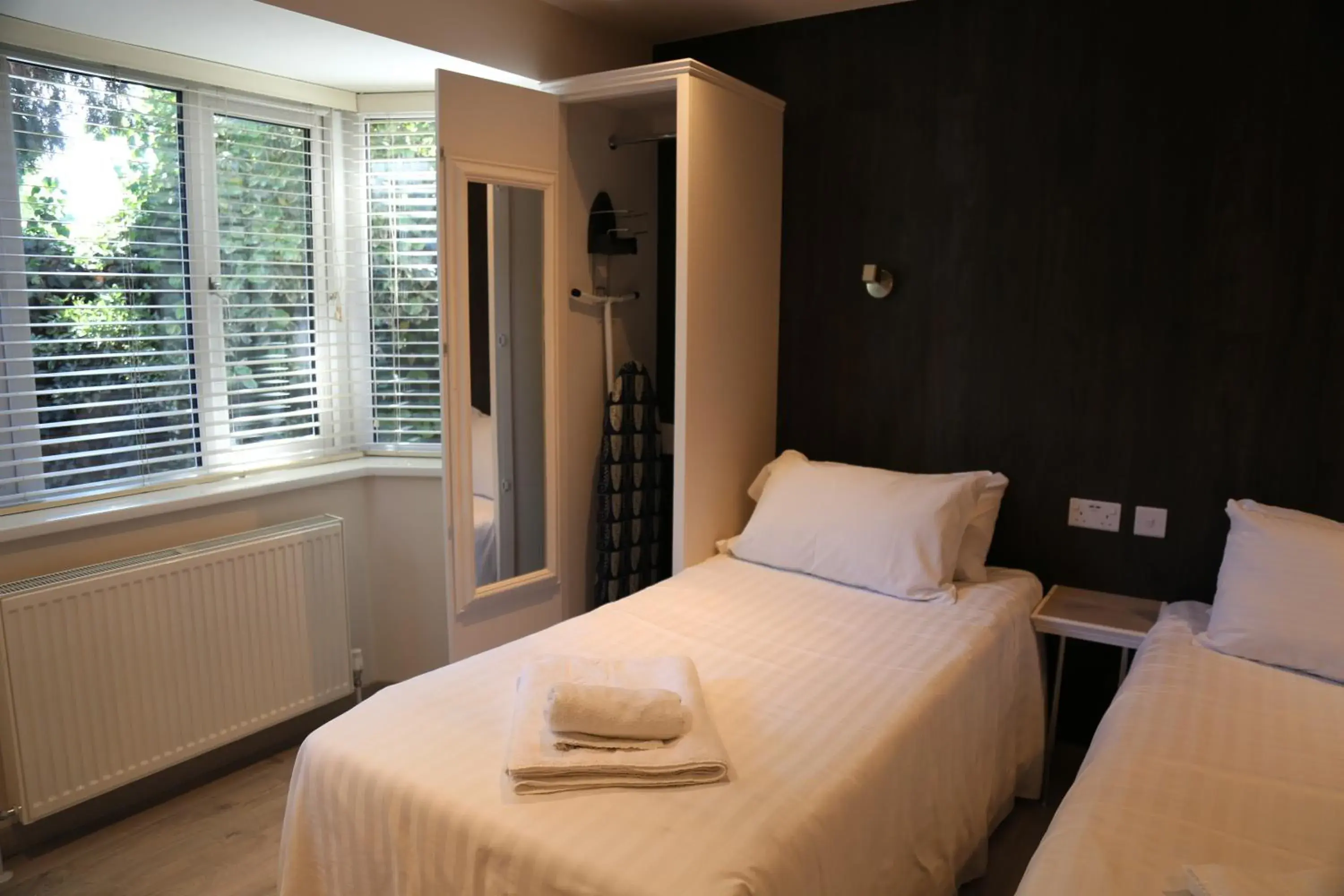 Bed in Debden Guest House