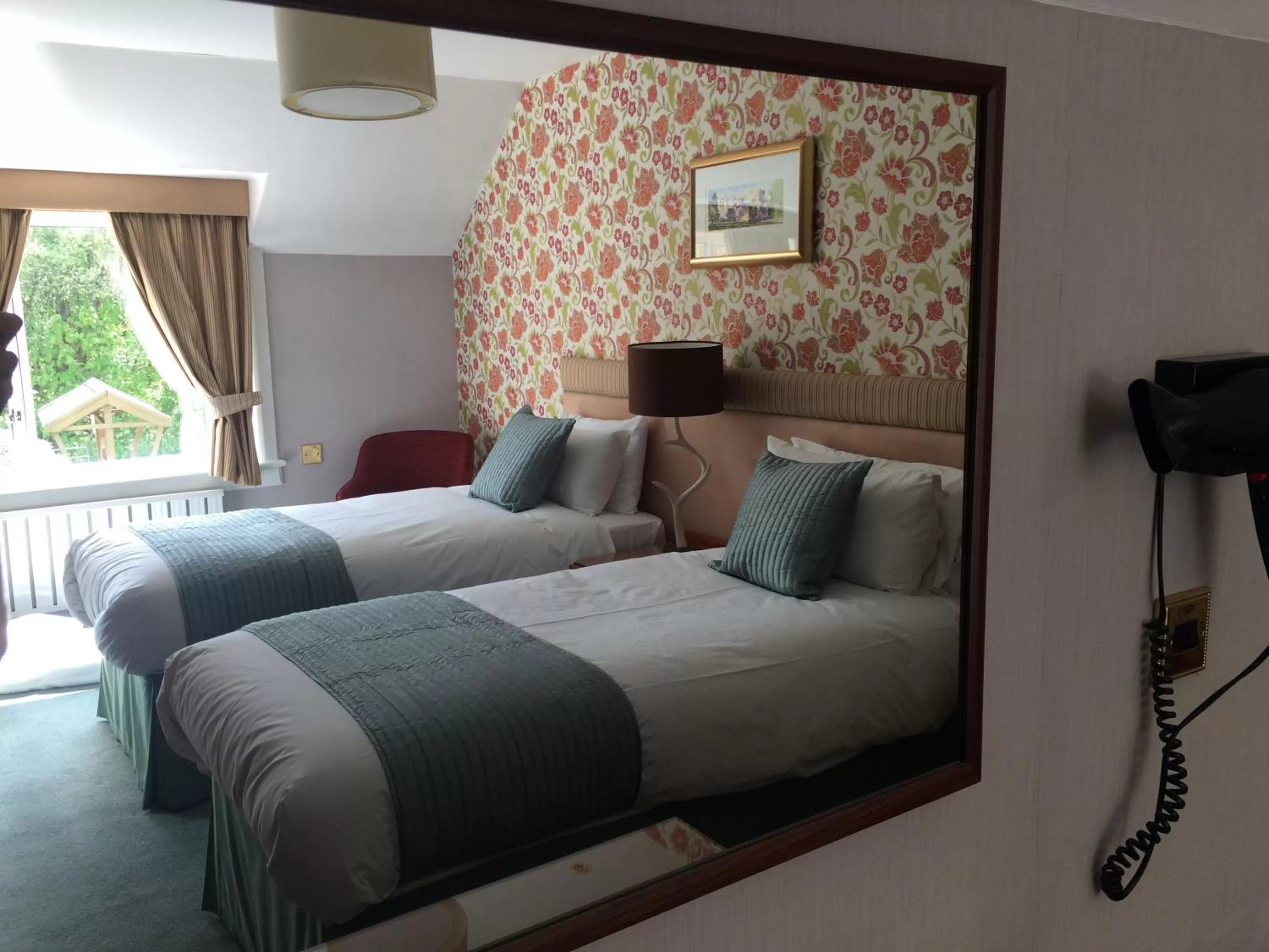 Decorative detail, Bed in The Stronlossit Inn