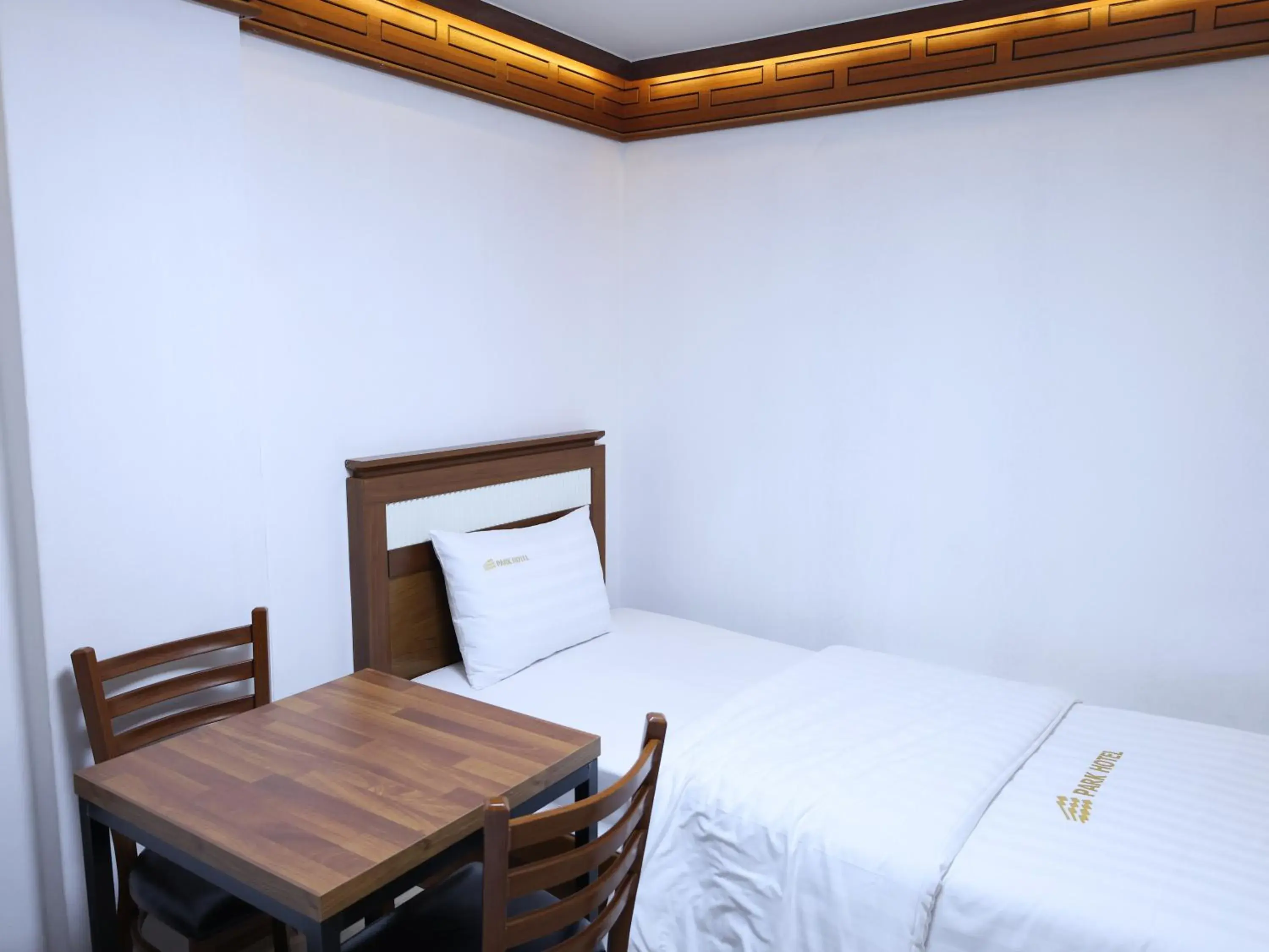 Bed in Goodstay Andong Park Hotel