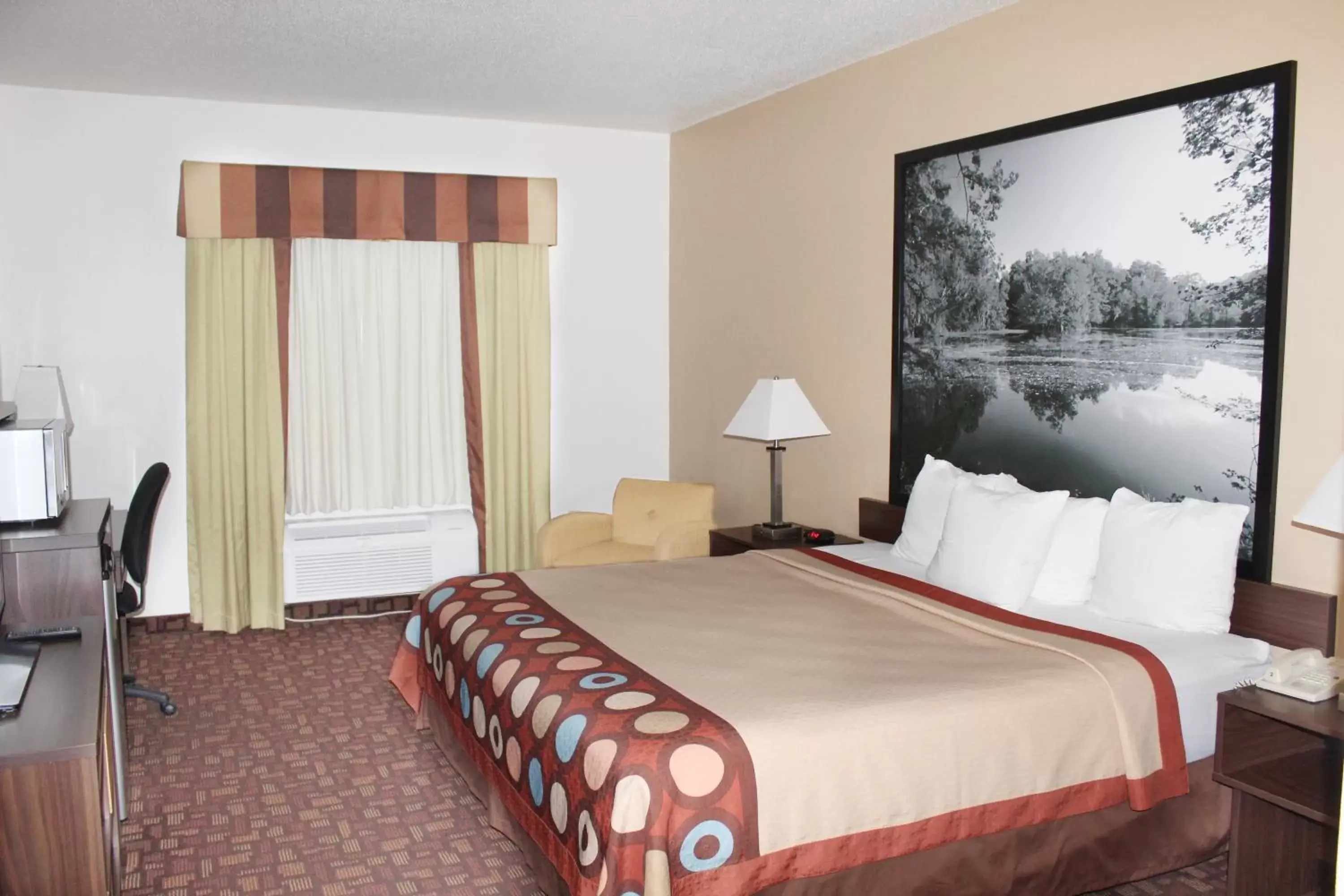 Bed in Super 8 by Wyndham Three Rivers